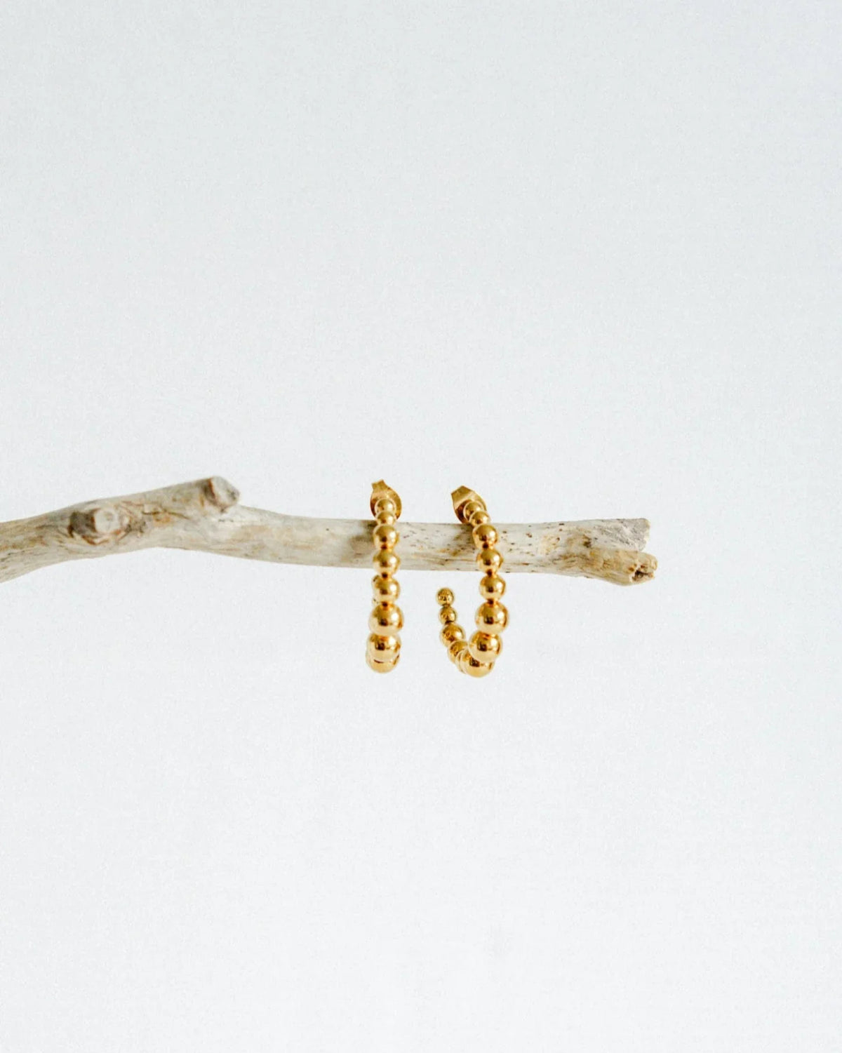 CASTEL & CO
The Bubble Hoops are a playful yet sophisticated take on the classic hoop earring, featuring smooth, rounded details that add texture and dimension to any look. Their gold-plated finish makes them effortlessly versatile, whether you’re dressing up or down.