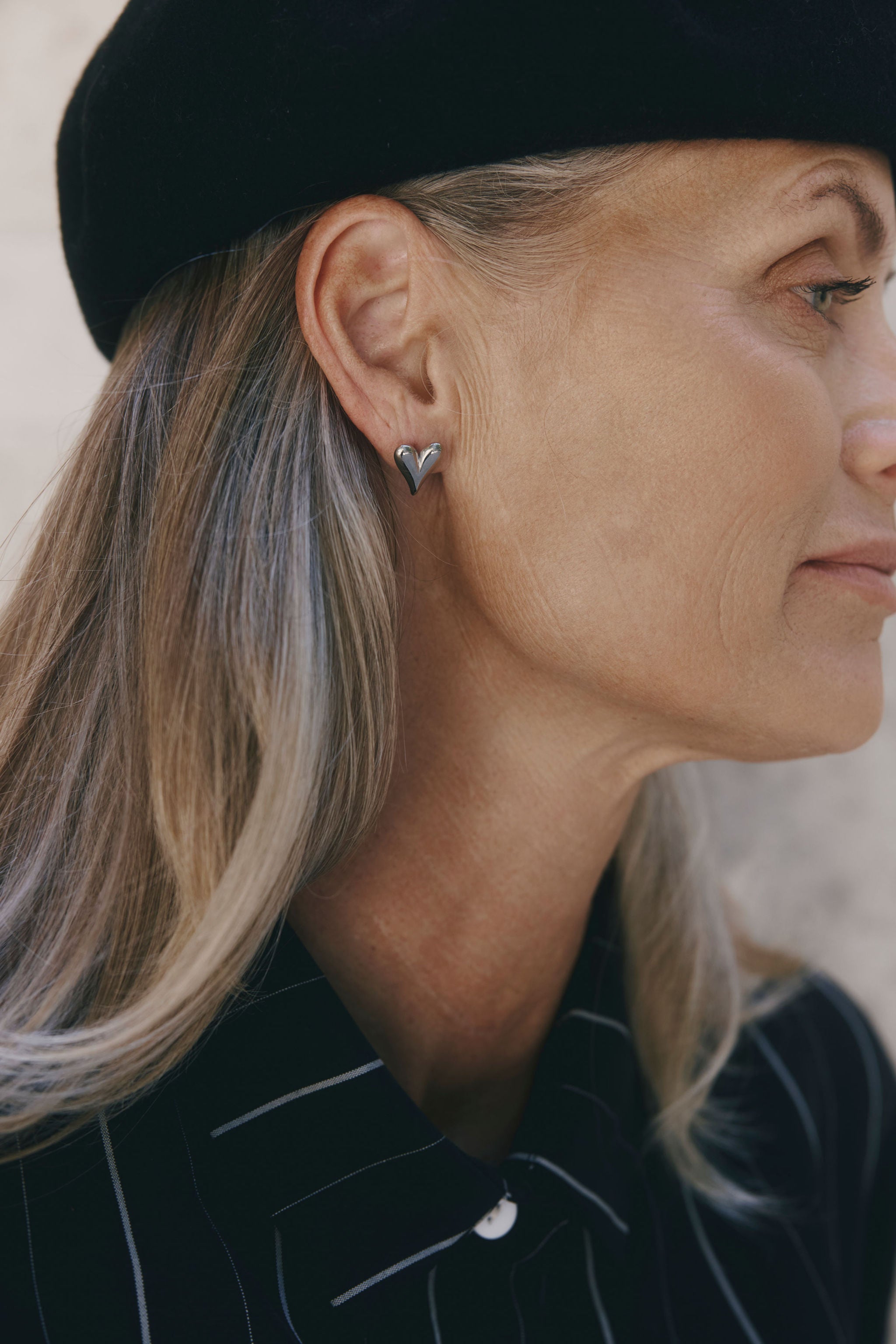 Camilla Earrings by Castel & Co are stainless steel stud earrings available in gold-plated and silver-tone finishes. Designed with a clean, refined look for everyday wear, they are lightweight (2g) for all-day comfort and measure 1.2 x 1.4 cm with a secure stud closure. Subtle and polished, ideal for elevating simple outfits. Hypoallergenic and waterproof.