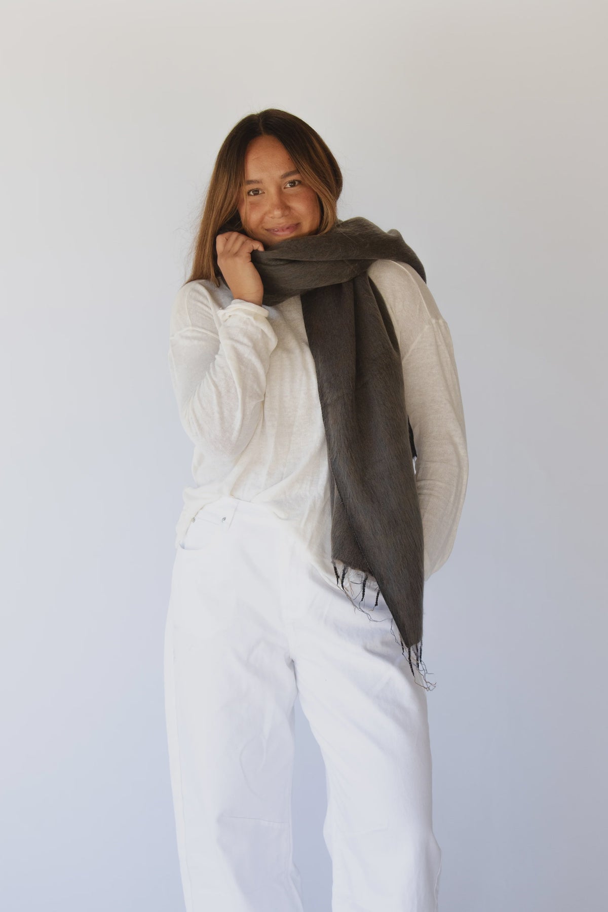 Meet the layer you’ll reach for repeatedly. Worn as a shawl, wrap or scarf, this timeless piece moves effortlessly from slow mornings to cool evenings. Cosy yet refined, it’s made for early yoga flows, windswept beach sunsets, and everything in between.

Lightweight but warming, it’s the ultimate travel companion - wrapping you in comfort and that familiar, at-home feeling wherever you land.

Available in: Mulberry &amp; Hazelnut.

Details
• Approx. 76cm x 188cm
• Cool hand-wash, dry with care
• Handwoven i