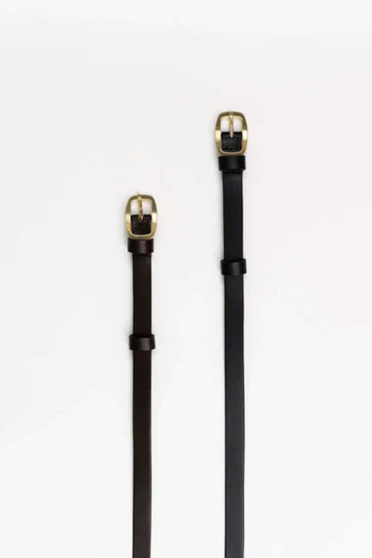 Humidity TWIGGY BELT a timeless belt crafted with 100% smooth leather, double leather keeper and rounded brass buckle. Belt width 1.6cm.