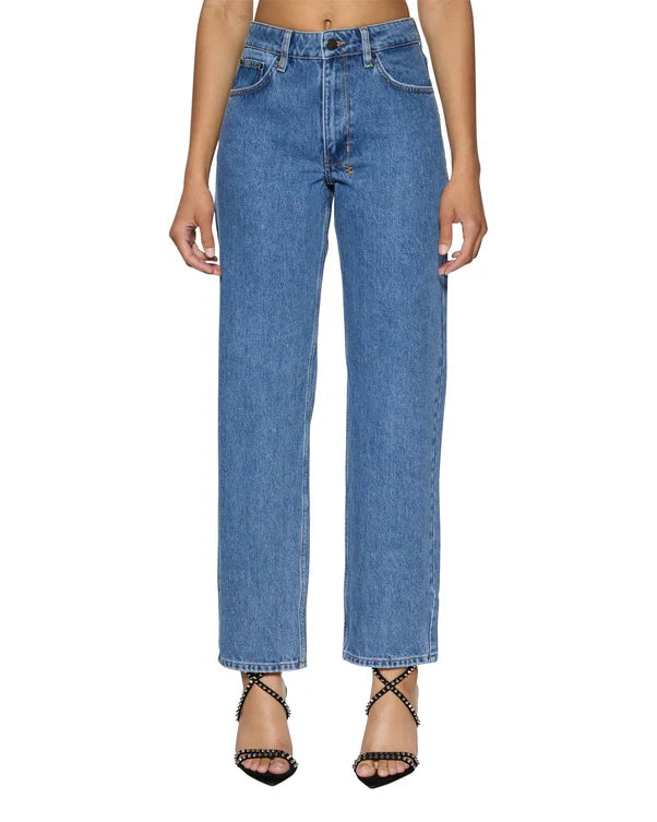 A mid-rise, relaxed straight-leg jean designed to sit below the waist with a more relaxed fit at the thigh and crotch to prevent gaping.&nbsp;It is made from premium European rigid denim in heritage stone-washed blue and features branded anti-silver hardware, T-box print, and back cross embroidery.