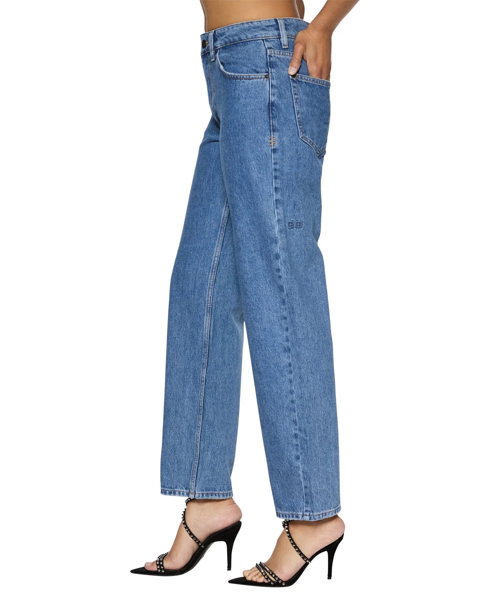 A mid-rise, relaxed straight-leg jean designed to sit below the waist with a more relaxed fit at the thigh and crotch to prevent gaping.&nbsp;It is made from premium European rigid denim in heritage stone-washed blue and features branded anti-silver hardware, T-box print, and back cross embroidery.