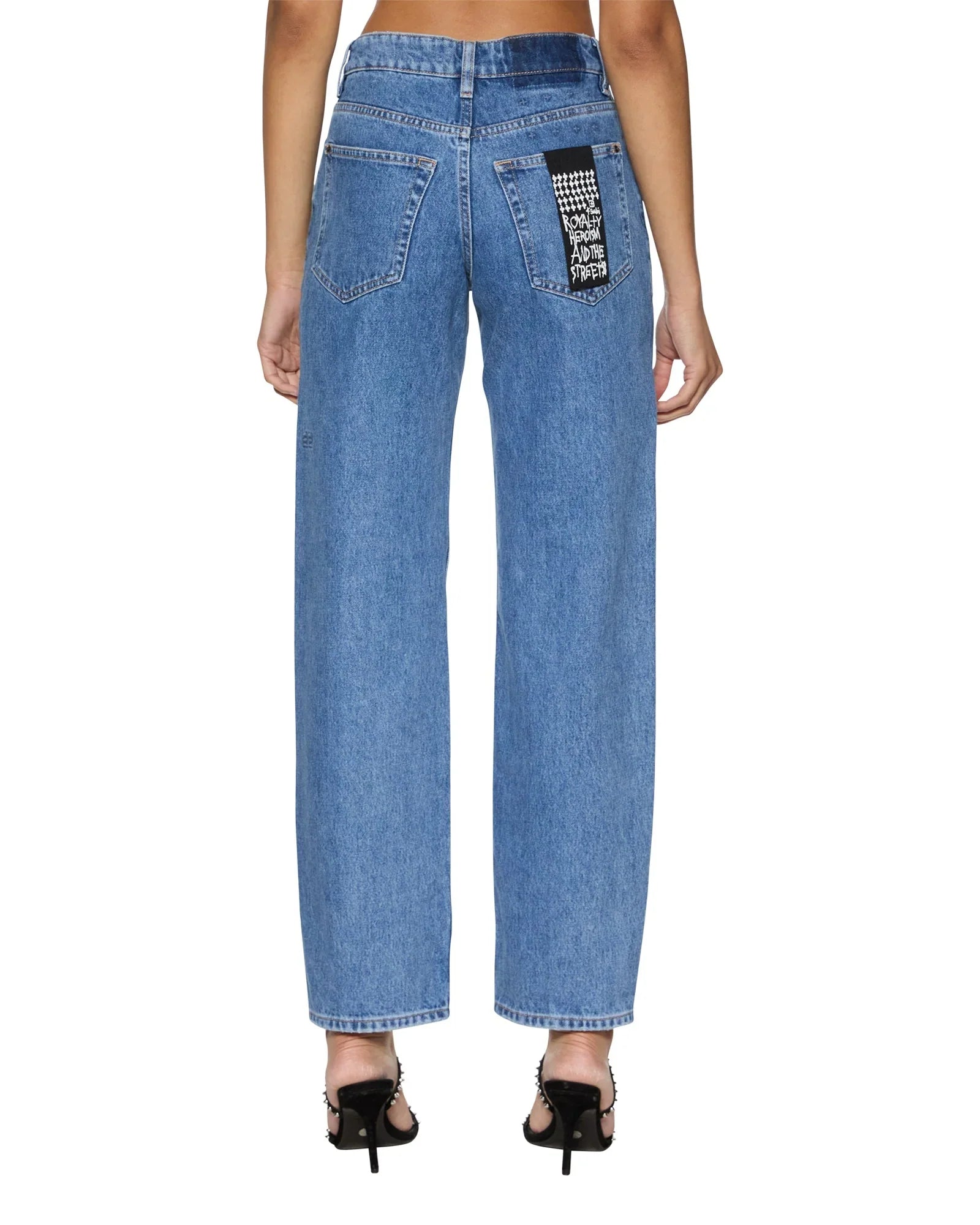 A mid-rise, relaxed straight-leg jean designed to sit below the waist with a more relaxed fit at the thigh and crotch to prevent gaping.&nbsp;It is made from premium European rigid denim in heritage stone-washed blue and features branded anti-silver hardware, T-box print, and back cross embroidery.