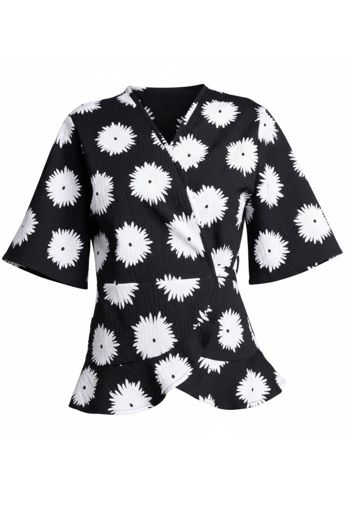 True Printed Top - Feminine Detail with a Statement Edge

A signature silhouette reimagined in print. The N-E-S True Printed Top brings together the flattering wrap shape of the True Top with our bold abstract black and white daisy print, creating a piece that feels both expressive and effortlessly wearable.

Designed and made responsibly in New Zealand