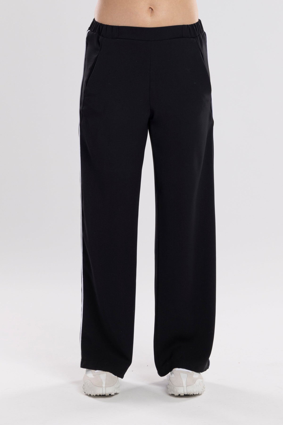 The NES Piped Gin Pants – a best-selling fit with elastic waist, side piping and 32" length. Comfortable, polished and designed for everyday wear.