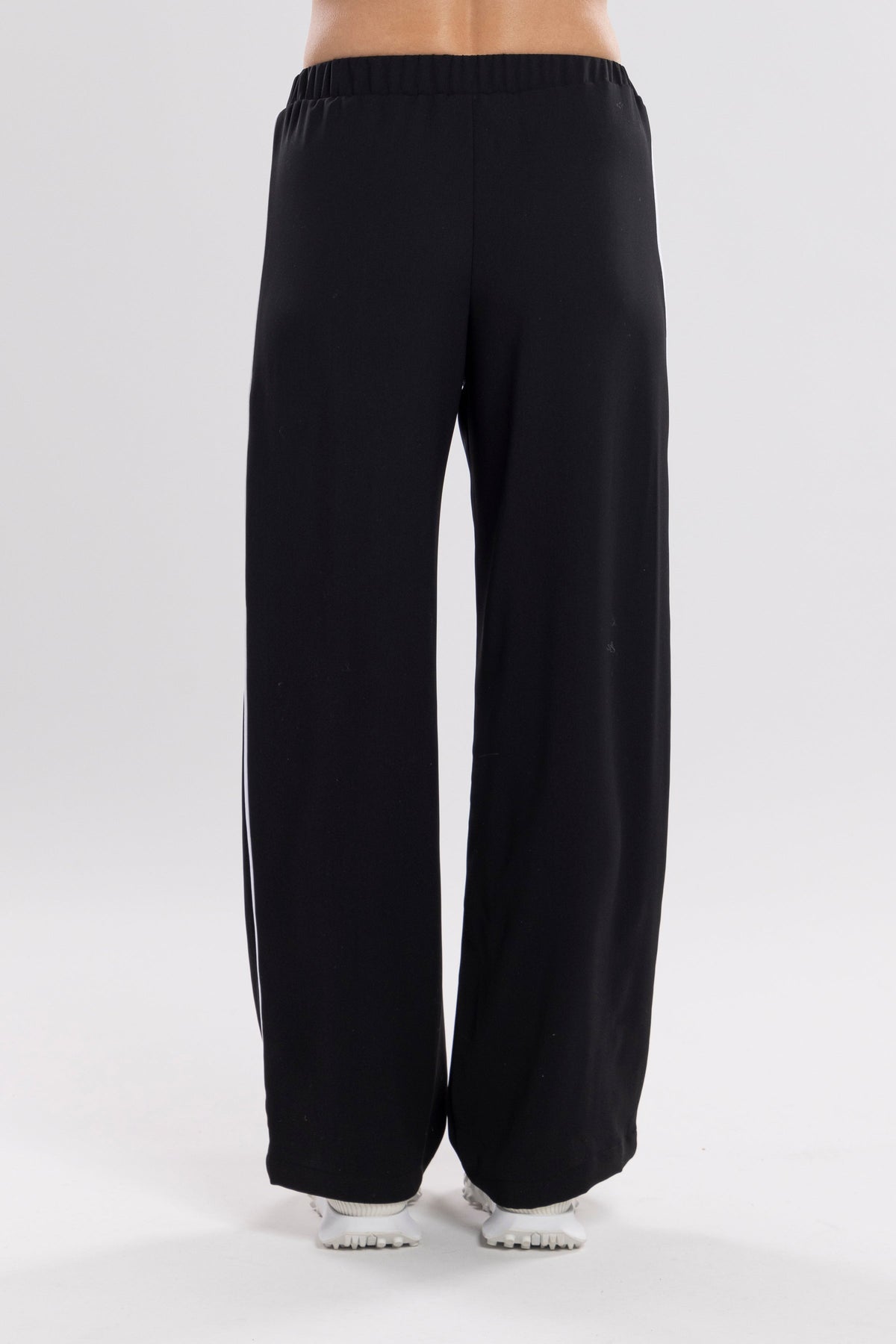 The NES Piped Gin Pants – a best-selling fit with elastic waist, side piping and 32" length. Comfortable, polished and designed for everyday wear.