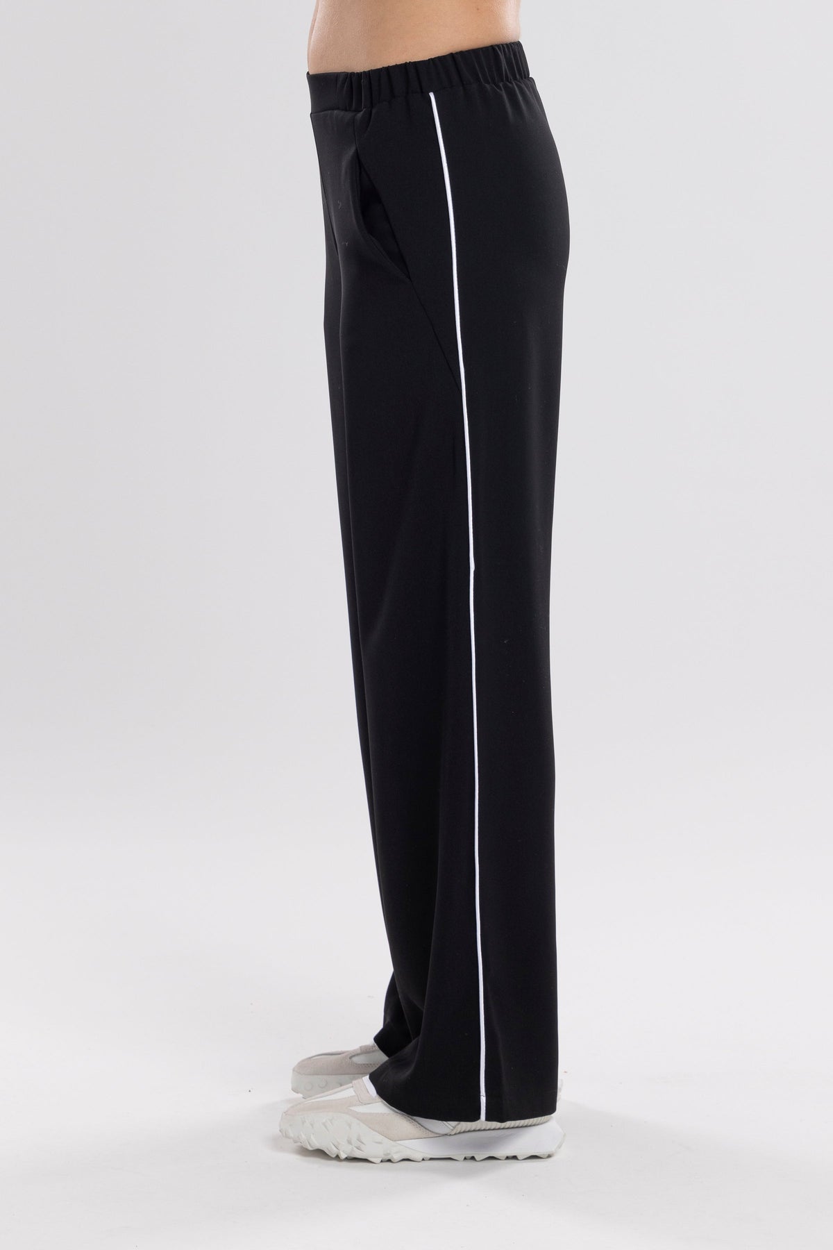 The NES Piped Gin Pants – a best-selling fit with elastic waist, side piping and 32" length. Comfortable, polished and designed for everyday wear.