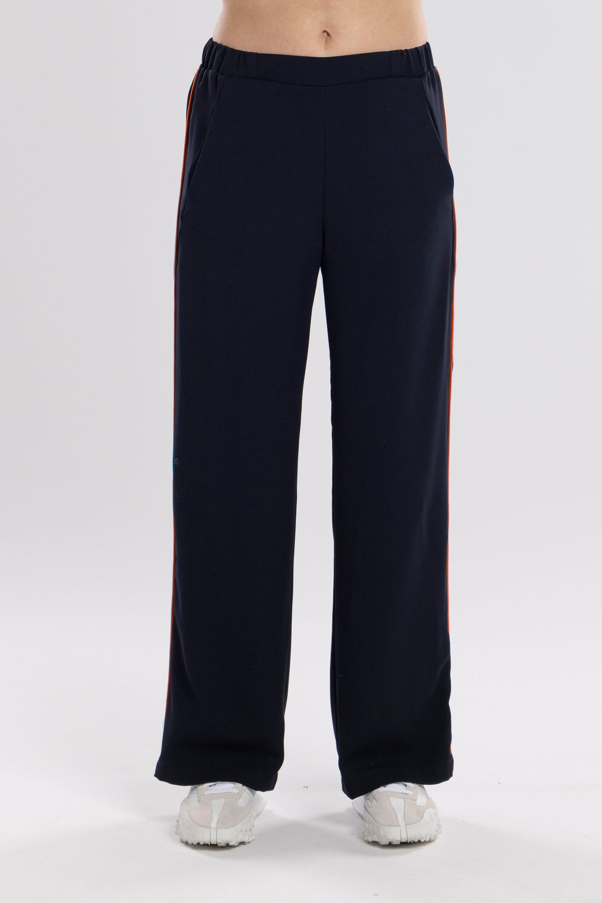 The NES Piped Gin Pants – a best-selling fit with elastic waist, side piping and 32" length. Comfortable, polished and designed for everyday wear.