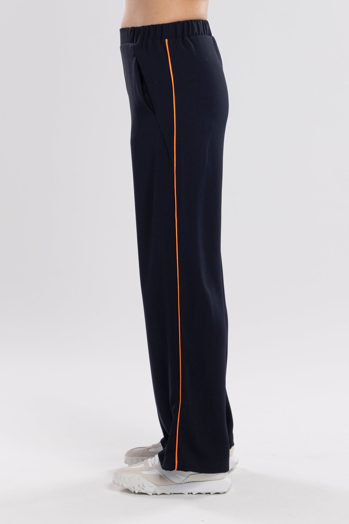 The NES Piped Gin Pants – a best-selling fit with elastic waist, side piping and 32" length. Comfortable, polished and designed for everyday wear.