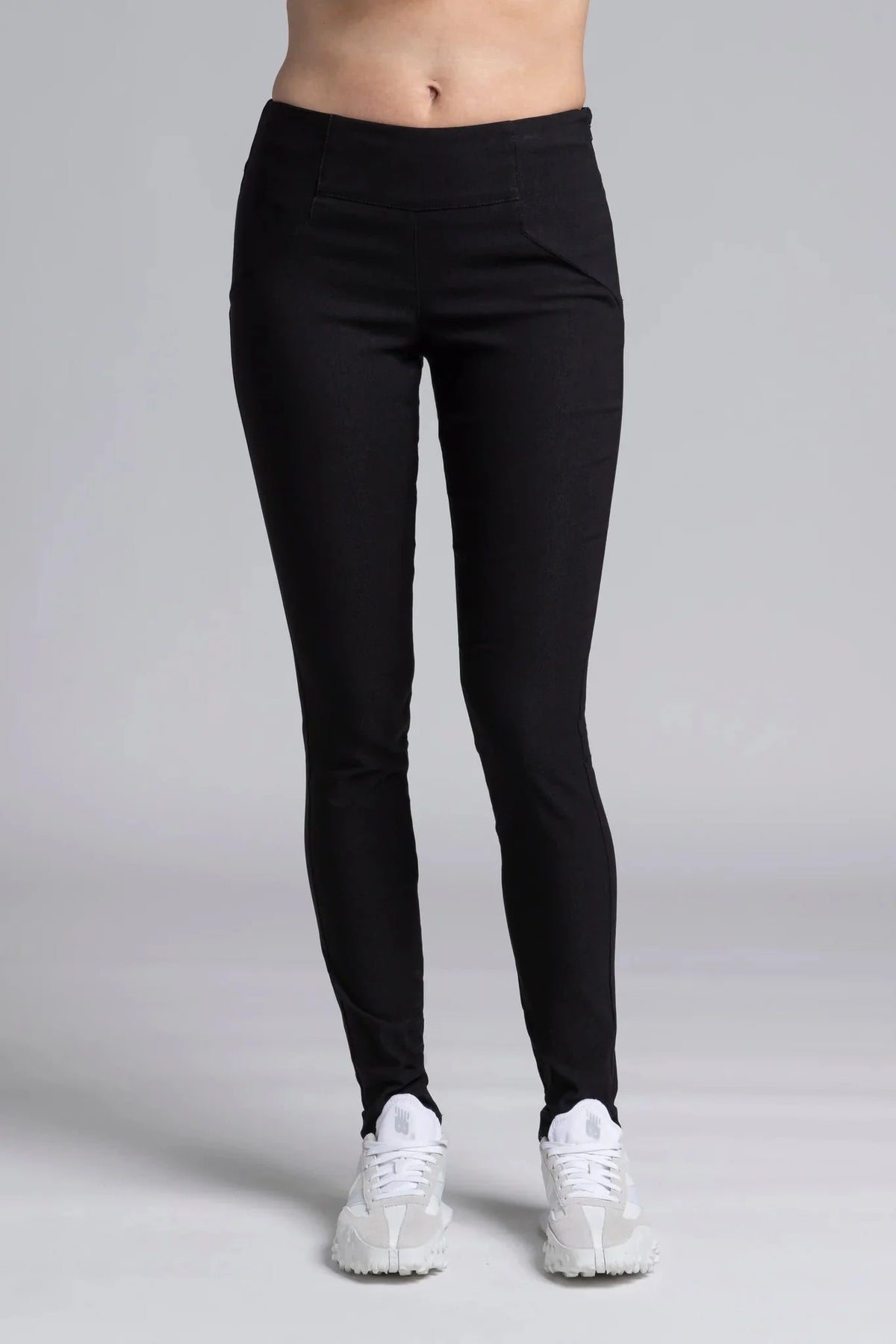 The NES Skinnie Minnies Pant is your go-to for sleek, everyday style with a modern edge. Crafted from the same super stretchy twill fabric you love, these pants are all about a flattering fit and effortless comfort. Featuring a cigarette-style slim leg, flat waistband, and a concealed side seam zip, the Skinnie Minnies offer a streamlined silhouette that's both polished and wearable.