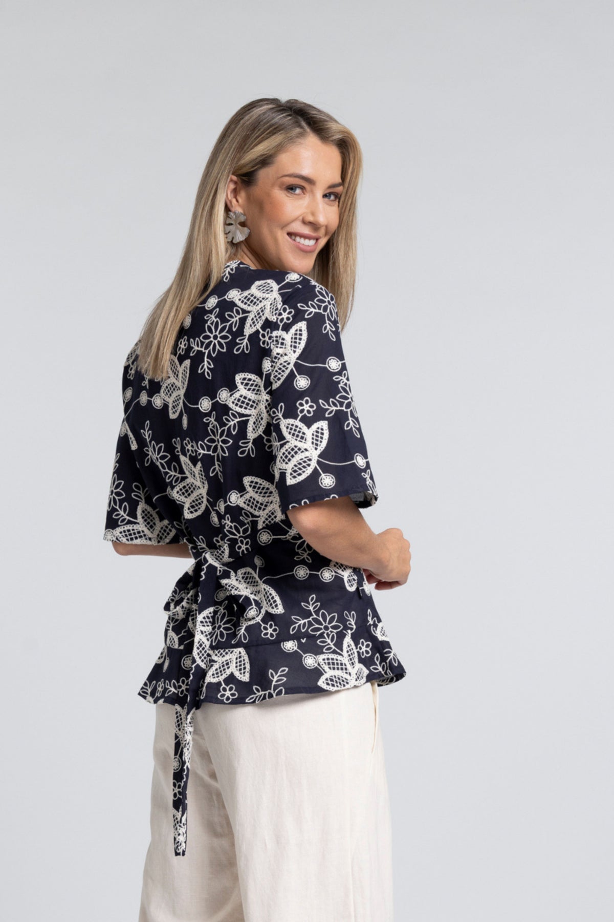 True Embroidery Top - Feminine Detail with Textural Depth

A refined take on a signature silhouette. The N-E-S True Embroidery Top brings together the flattering wrap shape of the True Top with a beautifully detailed embroidered fabric, creating a piece that feels both elevated and timeless.

Designed and made responsibly in New Zealand