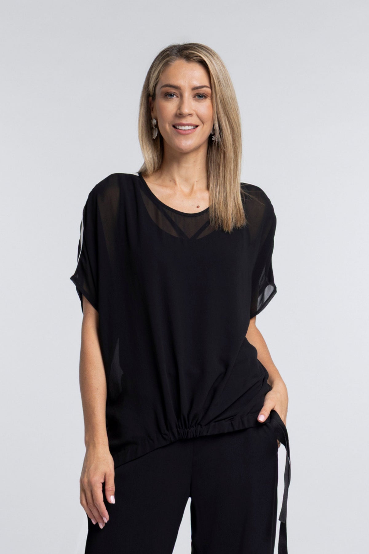 A true N-E-S icon, the Vanotti Tape Top is the piece customers return for season after season. Light, relaxed and beautifully easy to wear, it’s designed to be your effortless throw-on style for days when comfort and simplicity matter most.