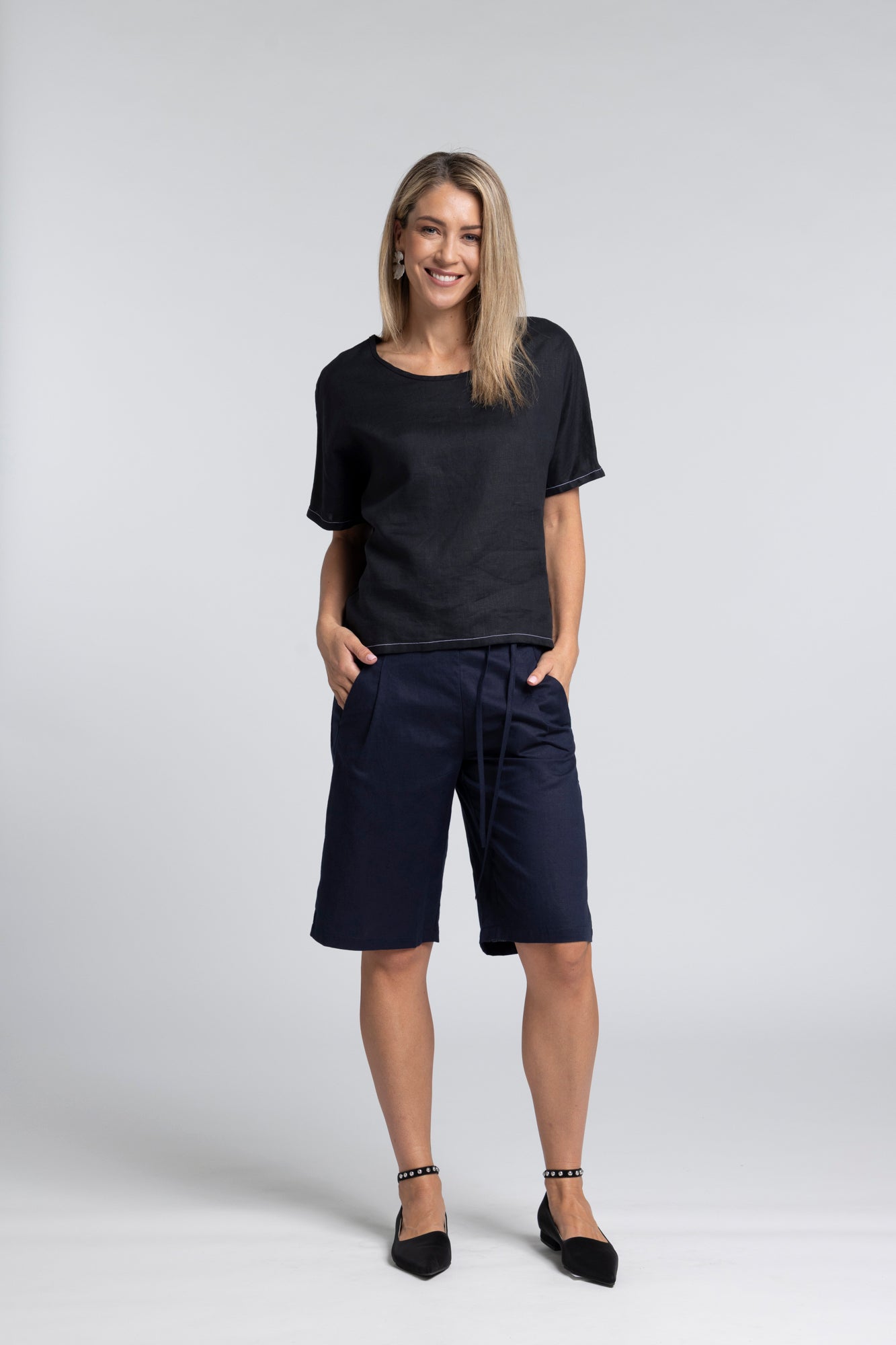 Mode Linen Blend Short - Effortless Shape with Everyday Ease

A refined take on relaxed tailoring. The N-E-S Mode Short delivers the same considered design as the Mode Pant, reworked into an easy, wearable short that balances comfort with a clean, modern silhouette.

Designed and made responsibly in New Zealand