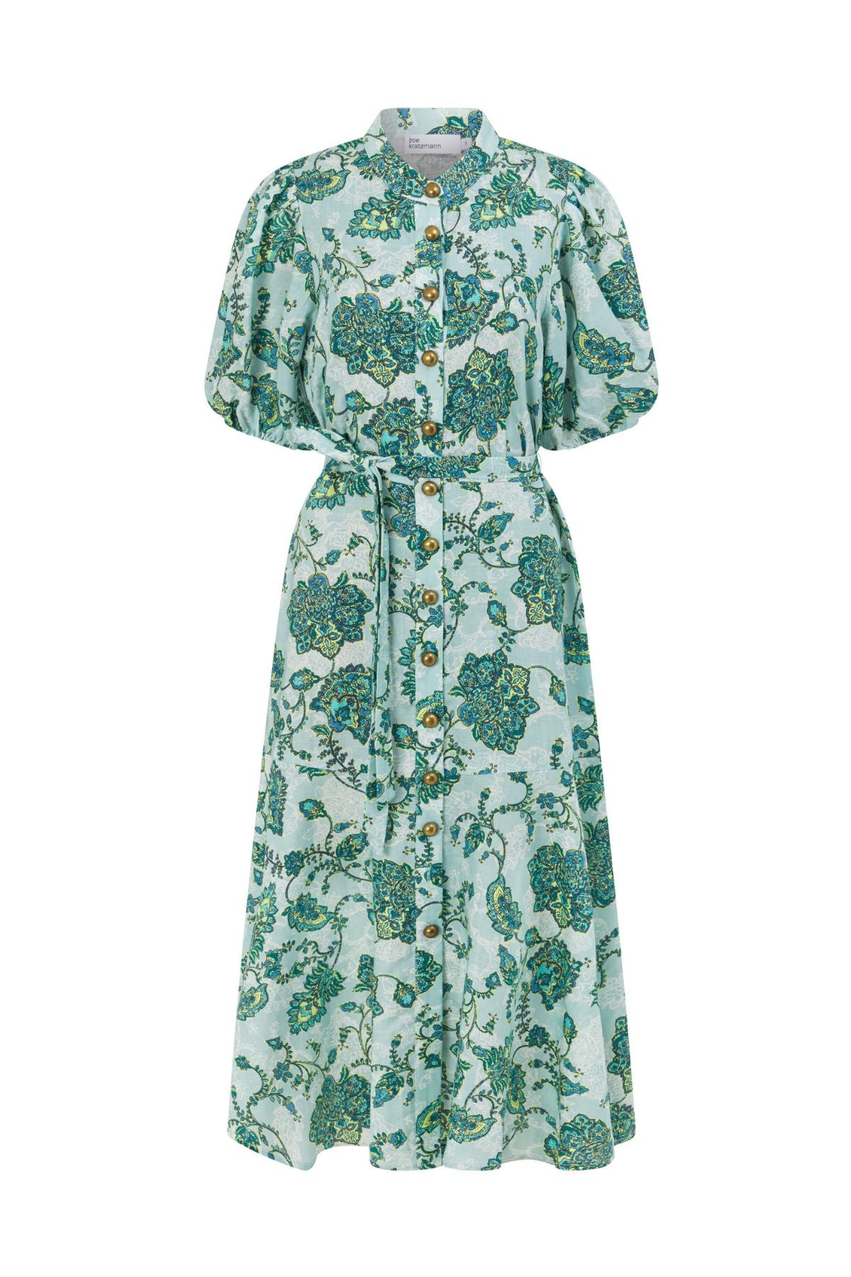 Discover the Zoe Kratzmann Cascade Dress in Fern Paisley. Crafted from 100% linen with antique brass buttons, gathered sleeves and a relaxed midi silhouette.