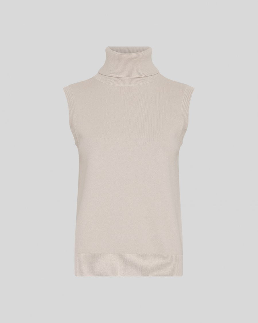 The MSCH Isabis R Vest is a versatile knitted layering piece designed with a clean, minimal silhouette. Featuring a high ribbed turtleneck and sleeveless shape, it offers effortless warmth without adding bulk. Ribbed detailing at the neckline, armholes and hem adds texture and a polished finish.