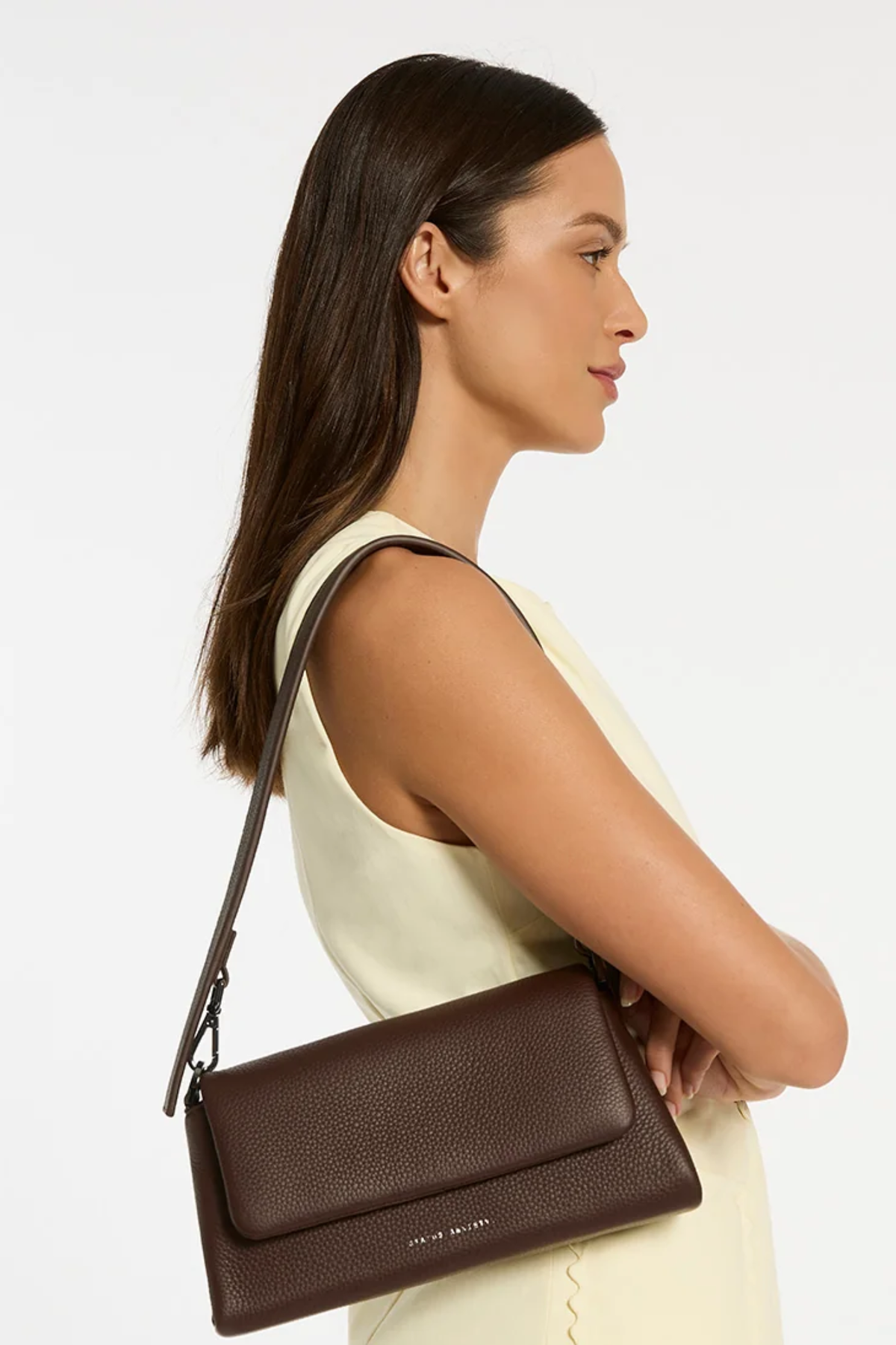 We don't take calling this bag Zenith lightly. As the new high point of your bag collection, 'Zenith' comes with a longer strap for use as a relaxed crossbody, or swap in the shorter strap to transform her into a dressier shoulder bag. On the back of the bag there's a slider pocket for easy phone storage/access, and on the front, a fancy magnet close flap that'll have you opening and closing her just for the hell of it.