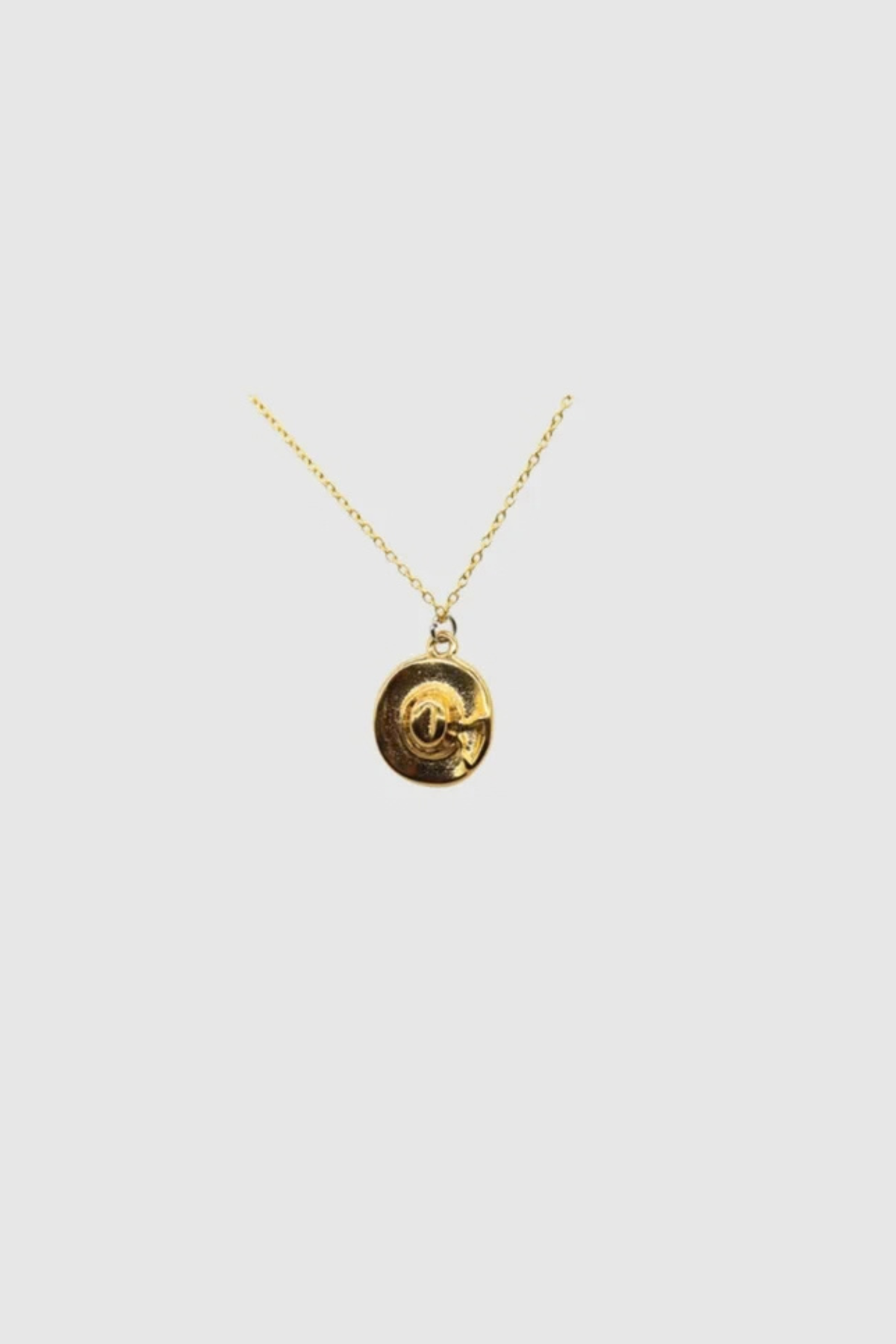 Howdy Necklace by Castel & Co is a gold-plated stainless steel necklace featuring a playful cowboy hat detail. Designed with a fine, lightweight chain to keep the look balanced and easy to wear, it works well layered or styled solo as a statement piece. Necklace length 40 + 5 cm extension, secured with a lobster claw clasp. Lightweight (5g), waterproof, and hypoallergenic.