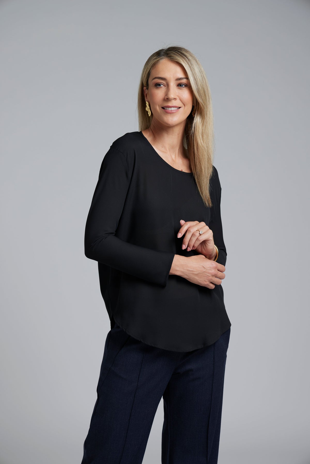 The NES Sable Top by N-E-S – a floaty georgette long sleeve top with scoop neck, curved hem and layering options. NZ made.