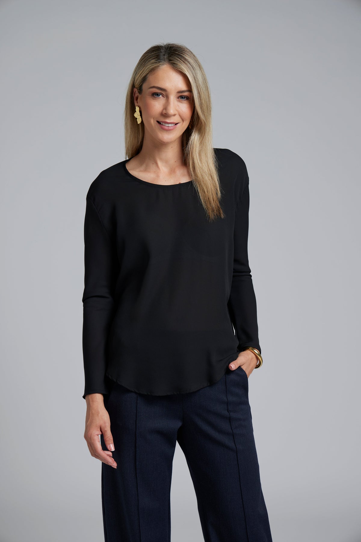 The NES Sable Top by N-E-S – a floaty georgette long sleeve top with scoop neck, curved hem and layering options. NZ made.