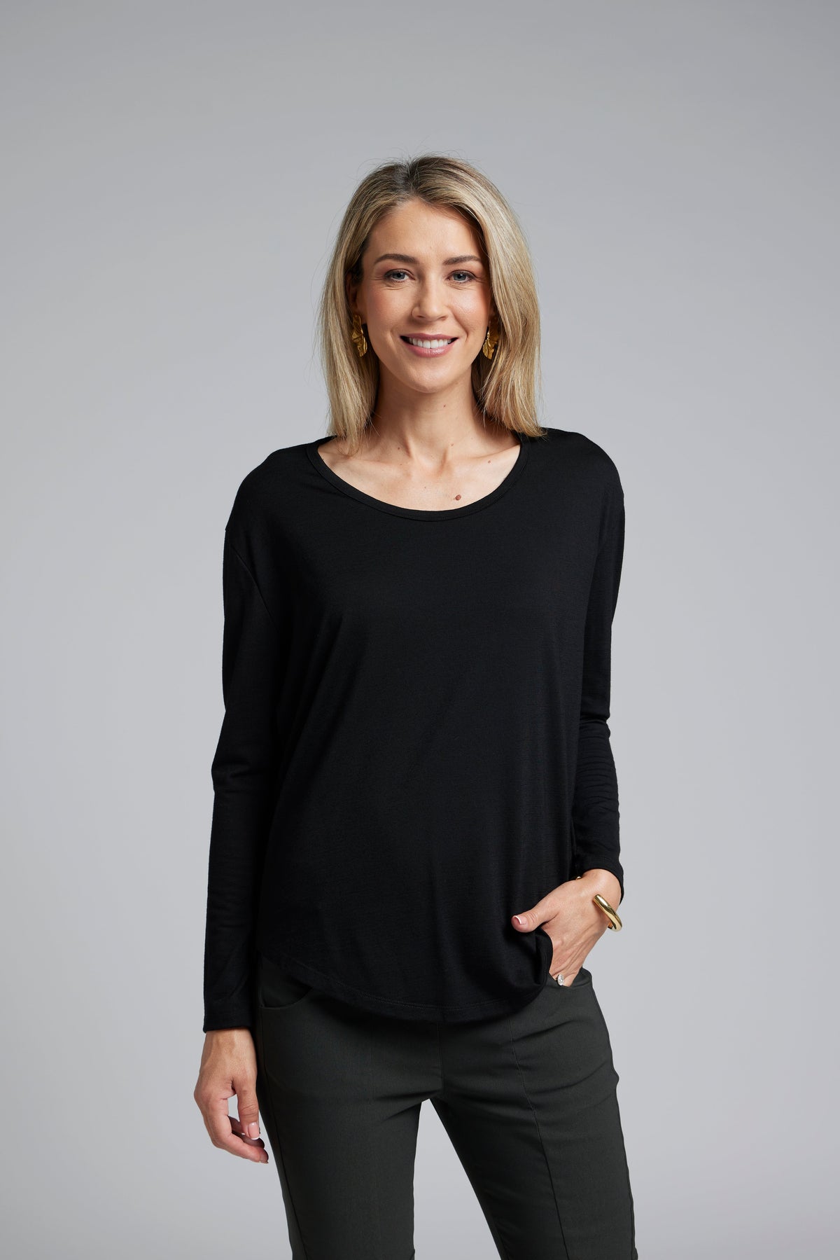 The NES Sable Top by N-E-S – a floaty georgette long sleeve top with scoop neck, curved hem and layering options. NZ made.