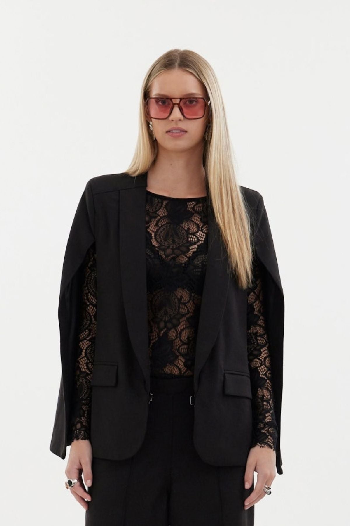The Siren Cape by Racket - a tailored cape jacket with sleek contrast lapels and subtle shoulder shaping. Style as a suit or with denim. NZ Made.
