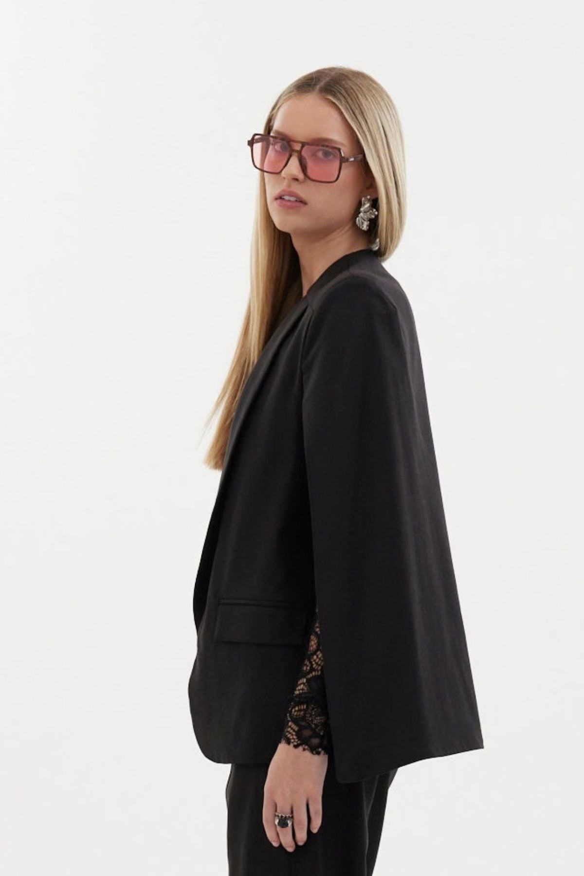 The Siren Cape by Racket - a tailored cape jacket with sleek contrast lapels and subtle shoulder shaping. Style as a suit or with denim. NZ Made.