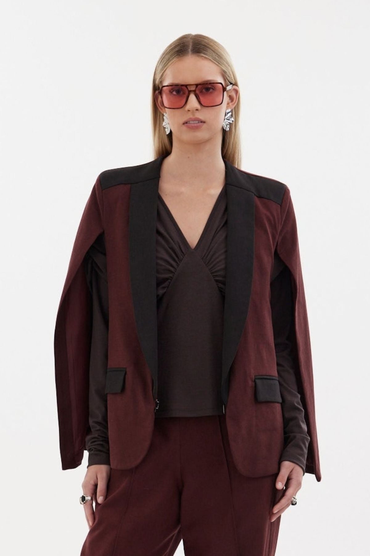 The Siren Cape by Racket - a tailored cape jacket with sleek contrast lapels and subtle shoulder shaping. Style as a suit or with denim. NZ Made.
