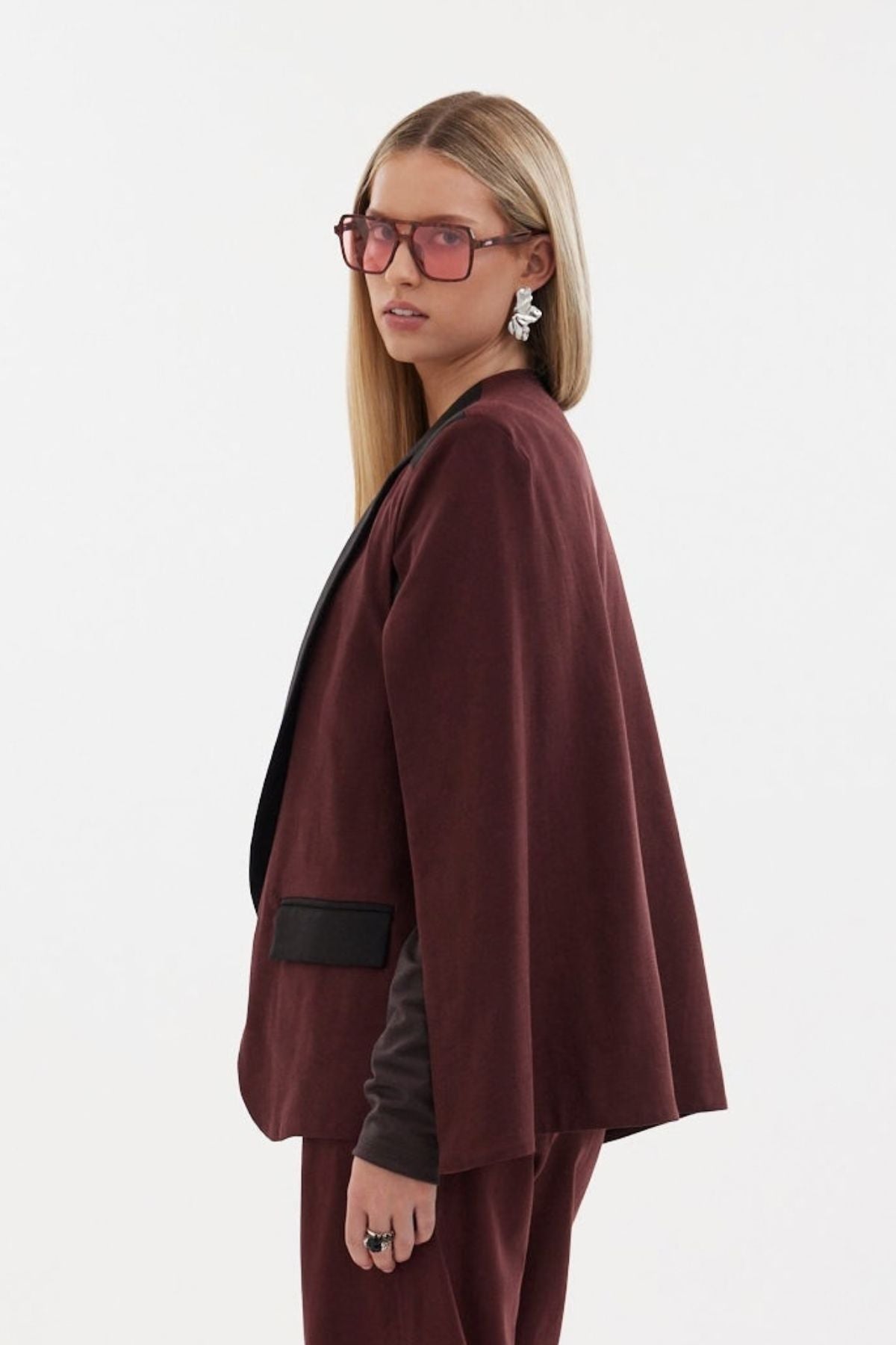 The Siren Cape by Racket - a tailored cape jacket with sleek contrast lapels and subtle shoulder shaping. Style as a suit or with denim. NZ Made.