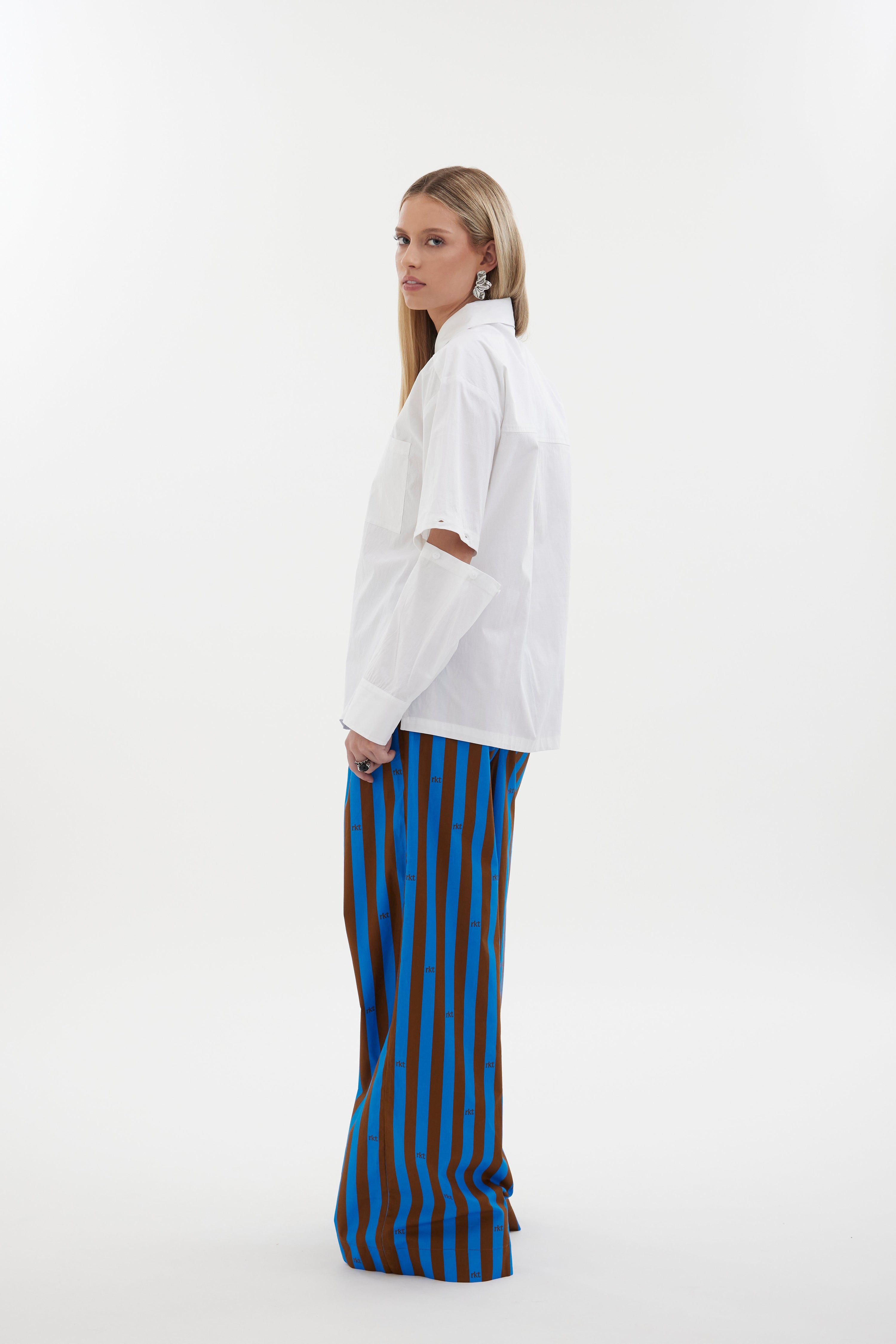 The Motion Pant by Racket — a wide leg cotton pant with double pleats and flexible comfort. Available in RKT Blue-Rust Stripe - long length. Made in NZ