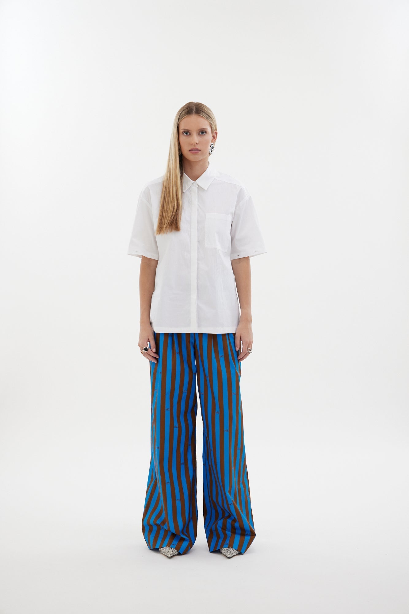 The Motion Pant by Racket — a wide leg cotton pant with double pleats and flexible comfort. Available in RKT Blue-Rust Stripe - long length. Made in NZ