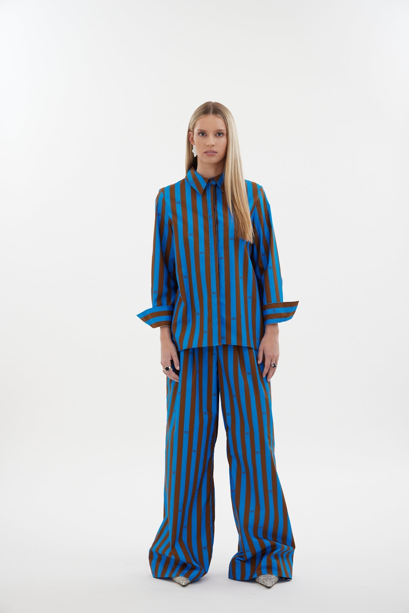 The Motion Pant by Racket — a wide leg cotton pant with double pleats and flexible comfort. Available in RKT Blue-Rust Stripe - long length. Made in NZ