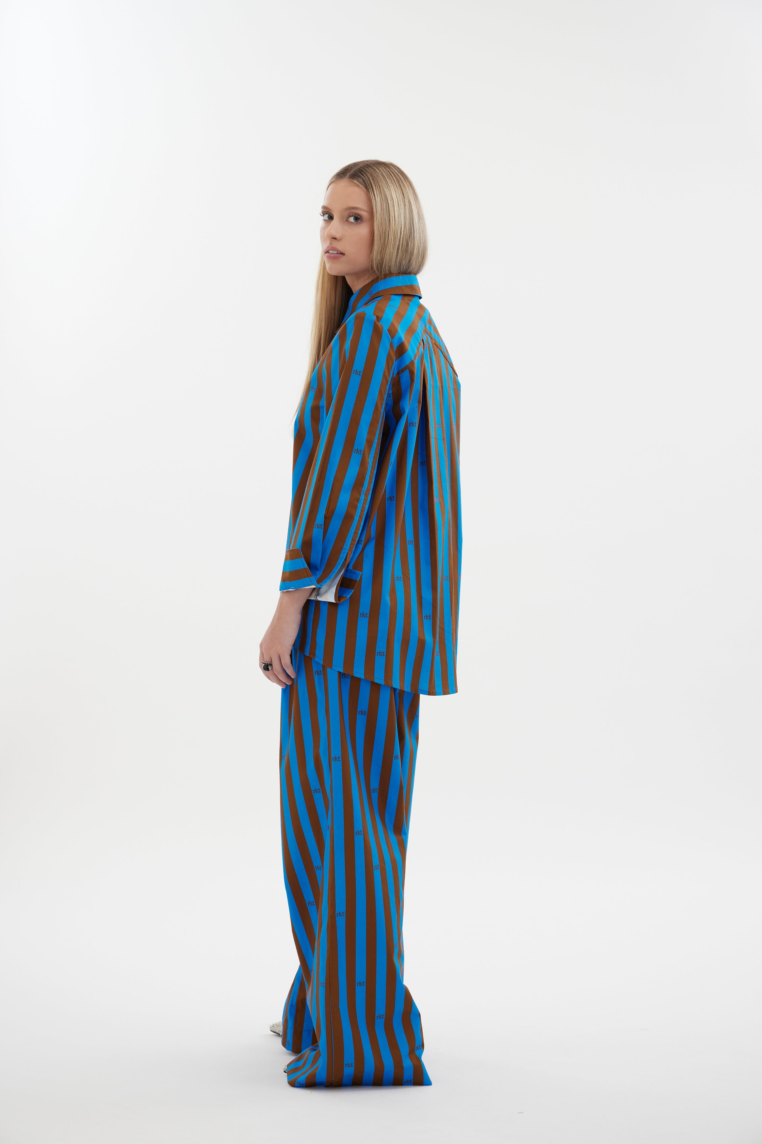 The Motion Pant by Racket — a wide leg cotton pant with double pleats and flexible comfort. Available in RKT Blue-Rust Stripe - long length. Made in NZ