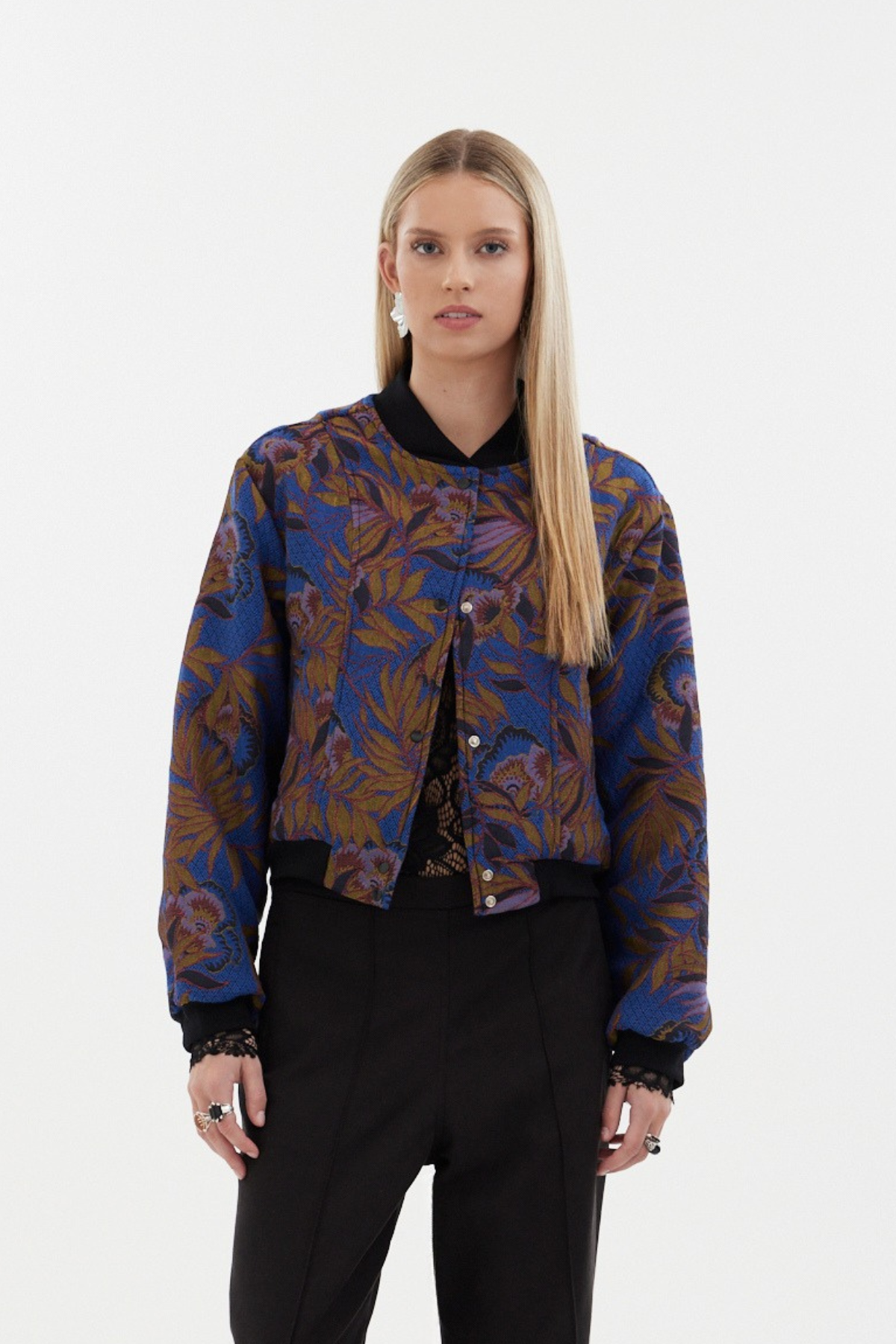 A statement layer that blends softness with attitude. The racket Florence Bomber Jacket brings a refined twist to a classic silhouette, combining floral jacquard texture with modern detailing for instant impact.

Soft structure with bold expression. A bomber that speaks for itself.

Designed and made responsibly in Aotearoa New Zealand