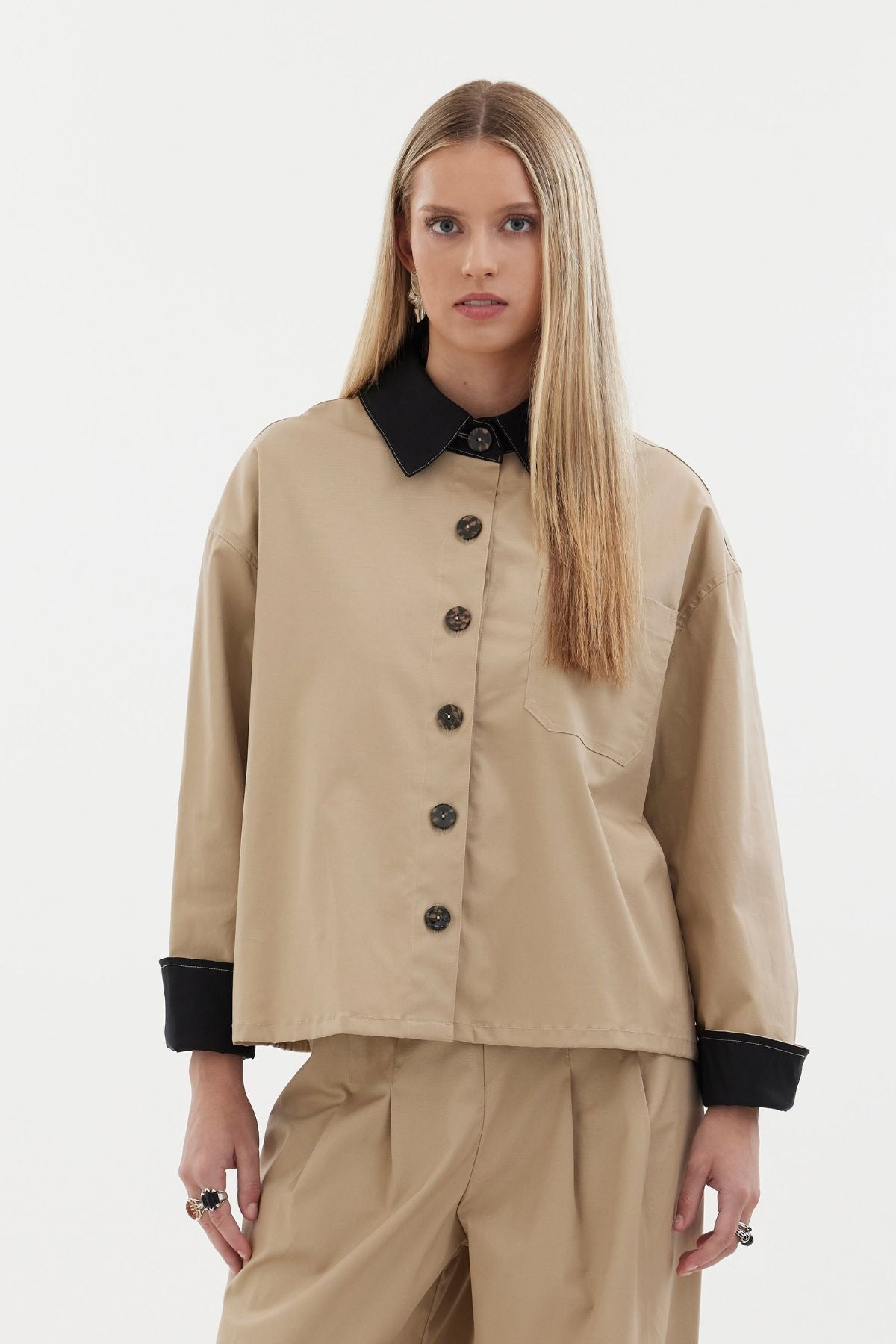 The Motion Shirt by Racket — a cropped, boxy shirt-shacket in cotton lycra with contrast details. Pair with the Motion Pant for a twin set. NZ made.