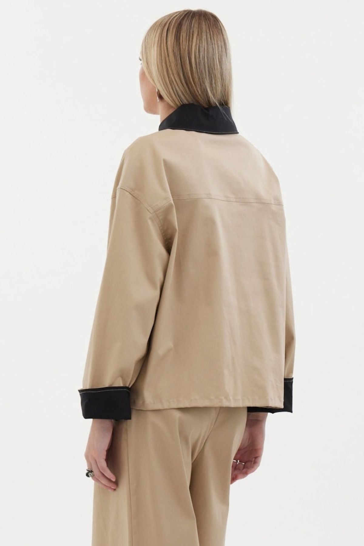 The Motion Shirt by Racket — a cropped, boxy shirt-shacket in cotton lycra with contrast details. Pair with the Motion Pant for a twin set. NZ made.