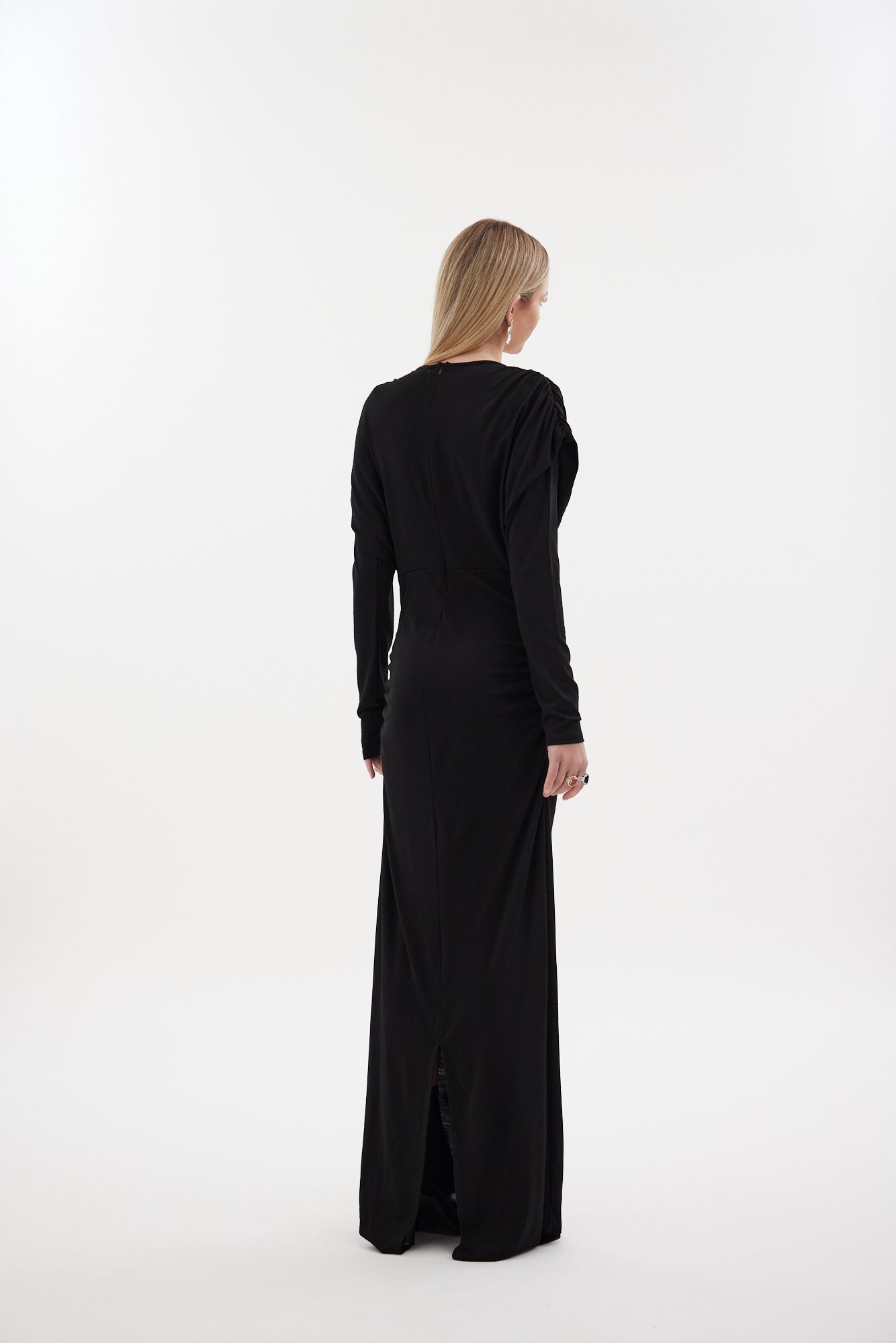 The Muse Dress by Racket - a 100% merino full-length dress with V-neck, rouched detailing and sleek sleeves. Refined comfort, made in NZ.