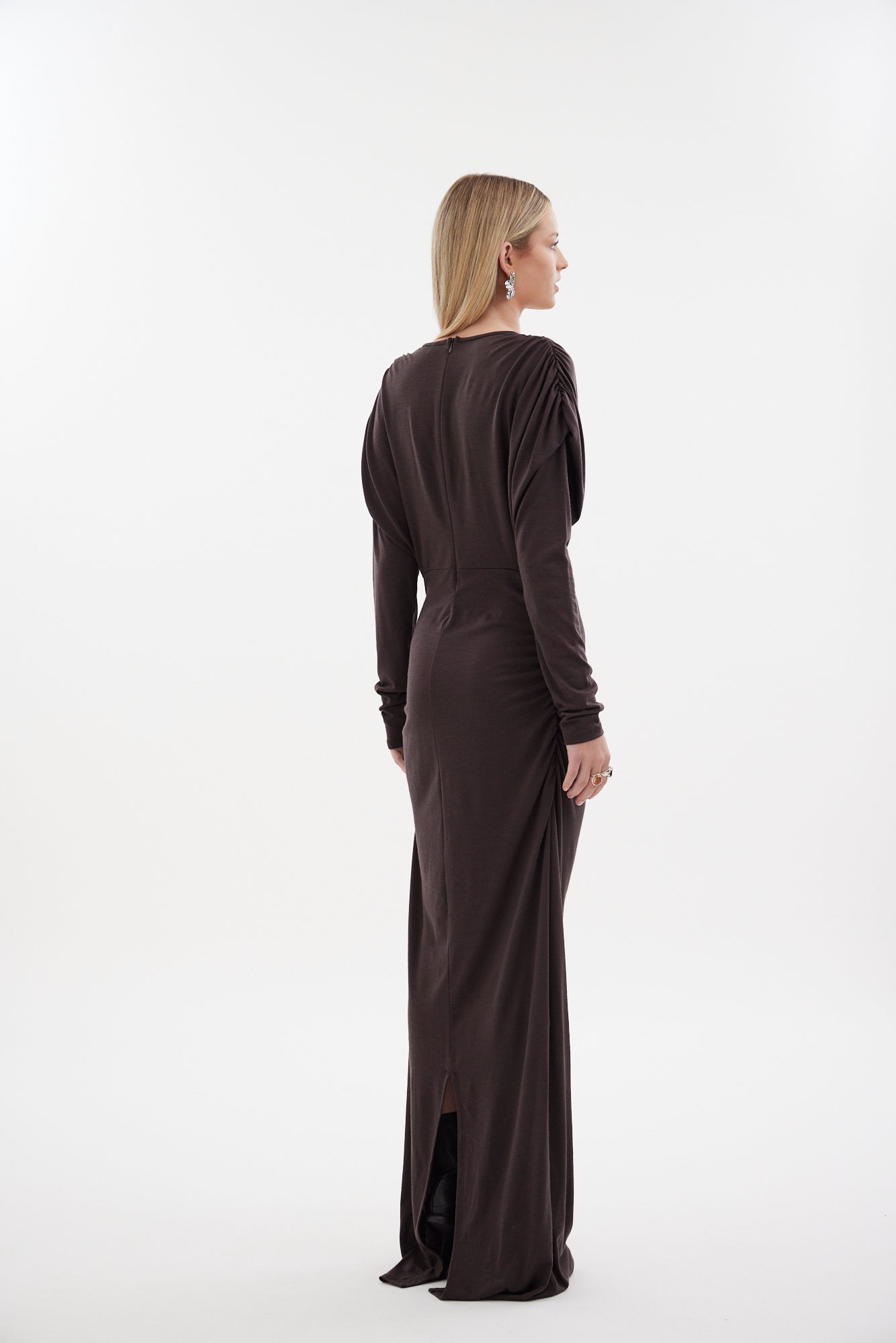 The Muse Dress by Racket - a 100% merino full-length dress with V-neck, rouched detailing and sleek sleeves. Refined comfort, made in NZ.