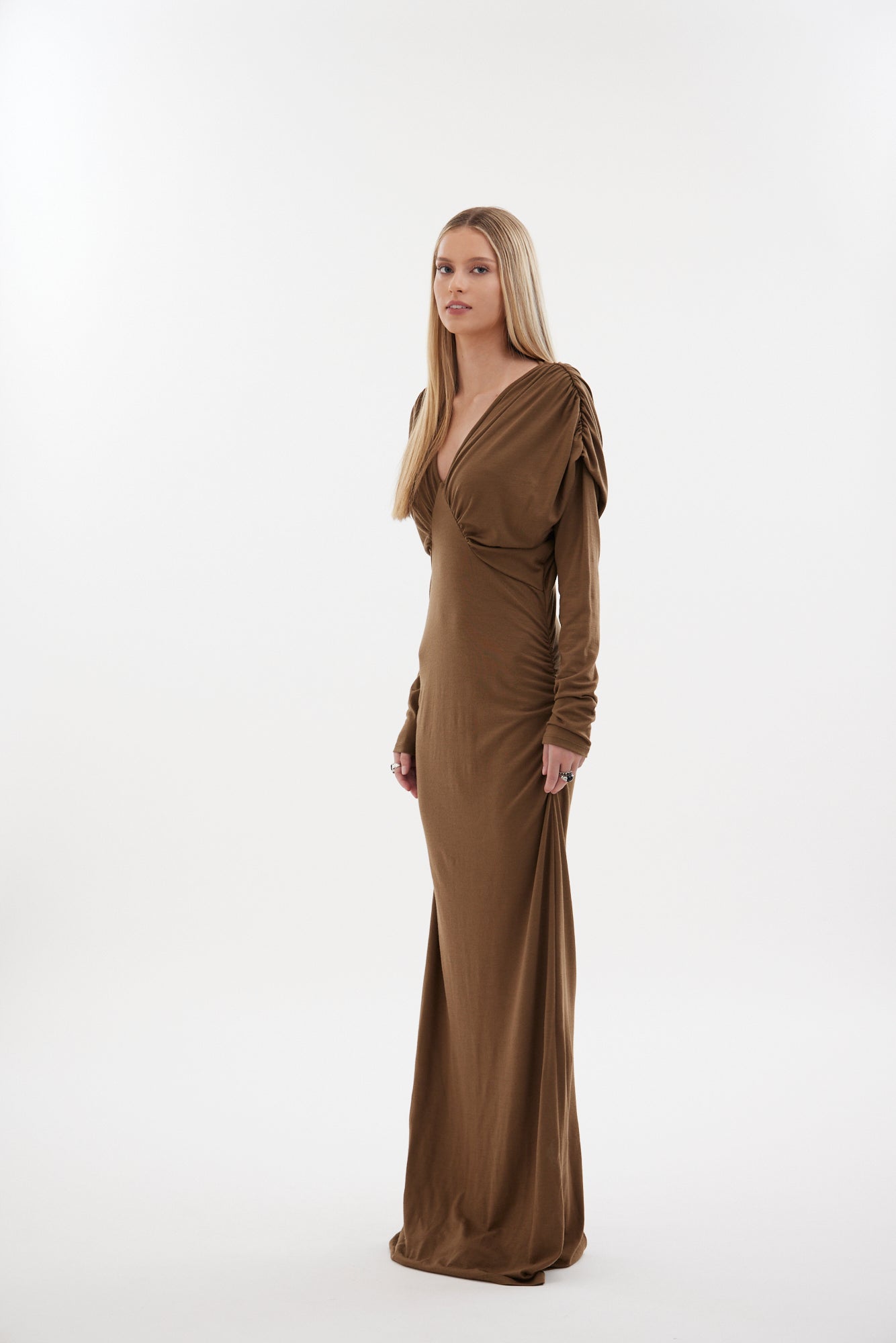 The Muse Dress by Racket - a 100% merino full-length dress with V-neck, rouched detailing and sleek sleeves. Refined comfort, made in NZ.