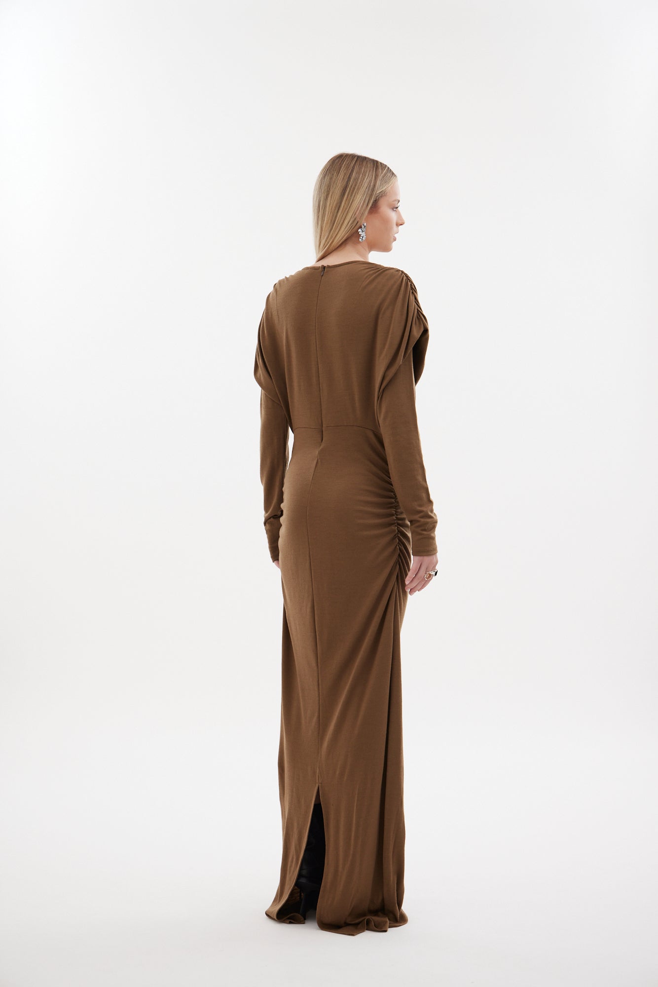 The Muse Dress by Racket - a 100% merino full-length dress with V-neck, rouched detailing and sleek sleeves. Refined comfort, made in NZ.
