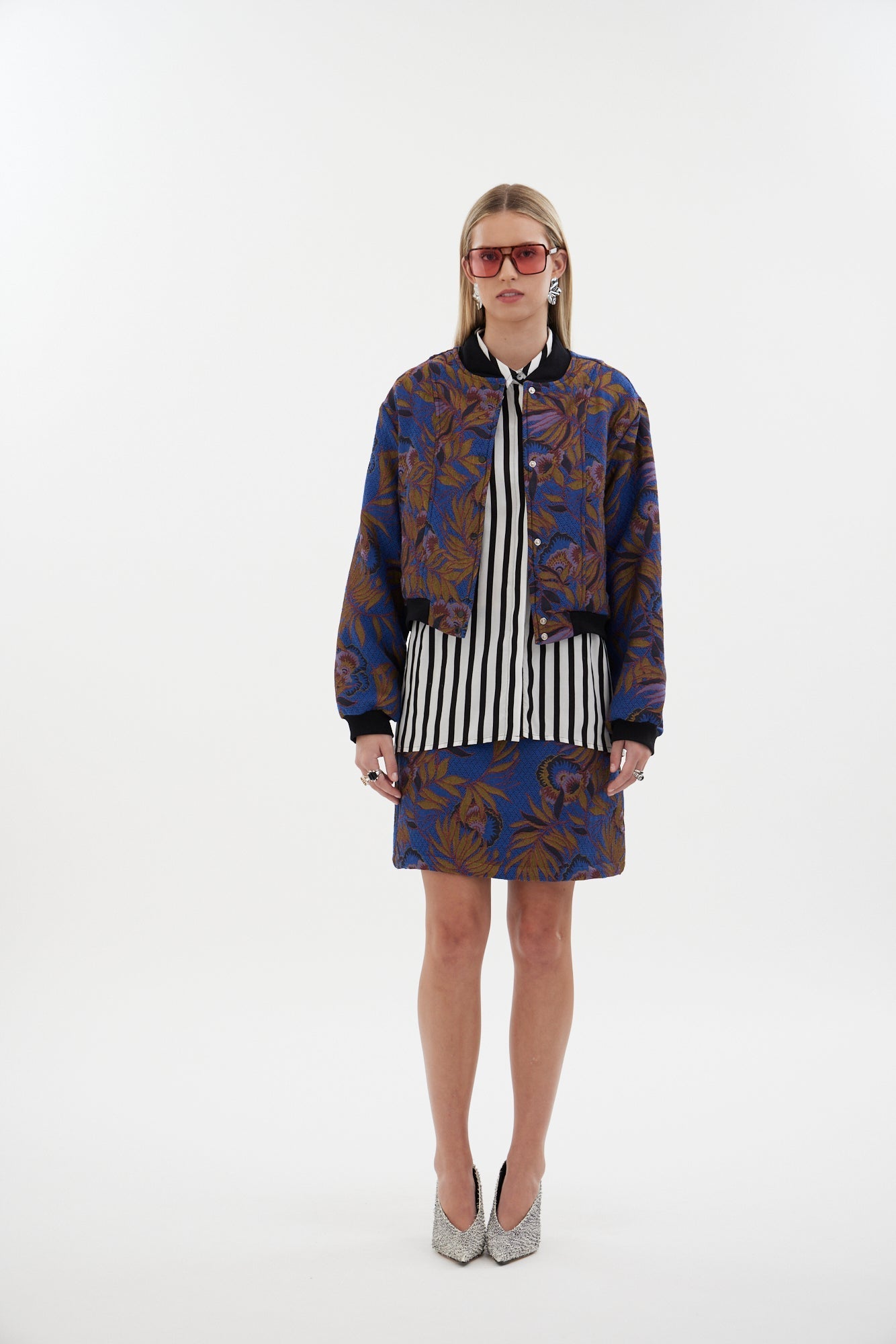 The Florence Skirt by Racket - a fully lined floral jacquard mini with concealed zip and refined shaping. Pair with the Florence Bomber. Made in NZ.
