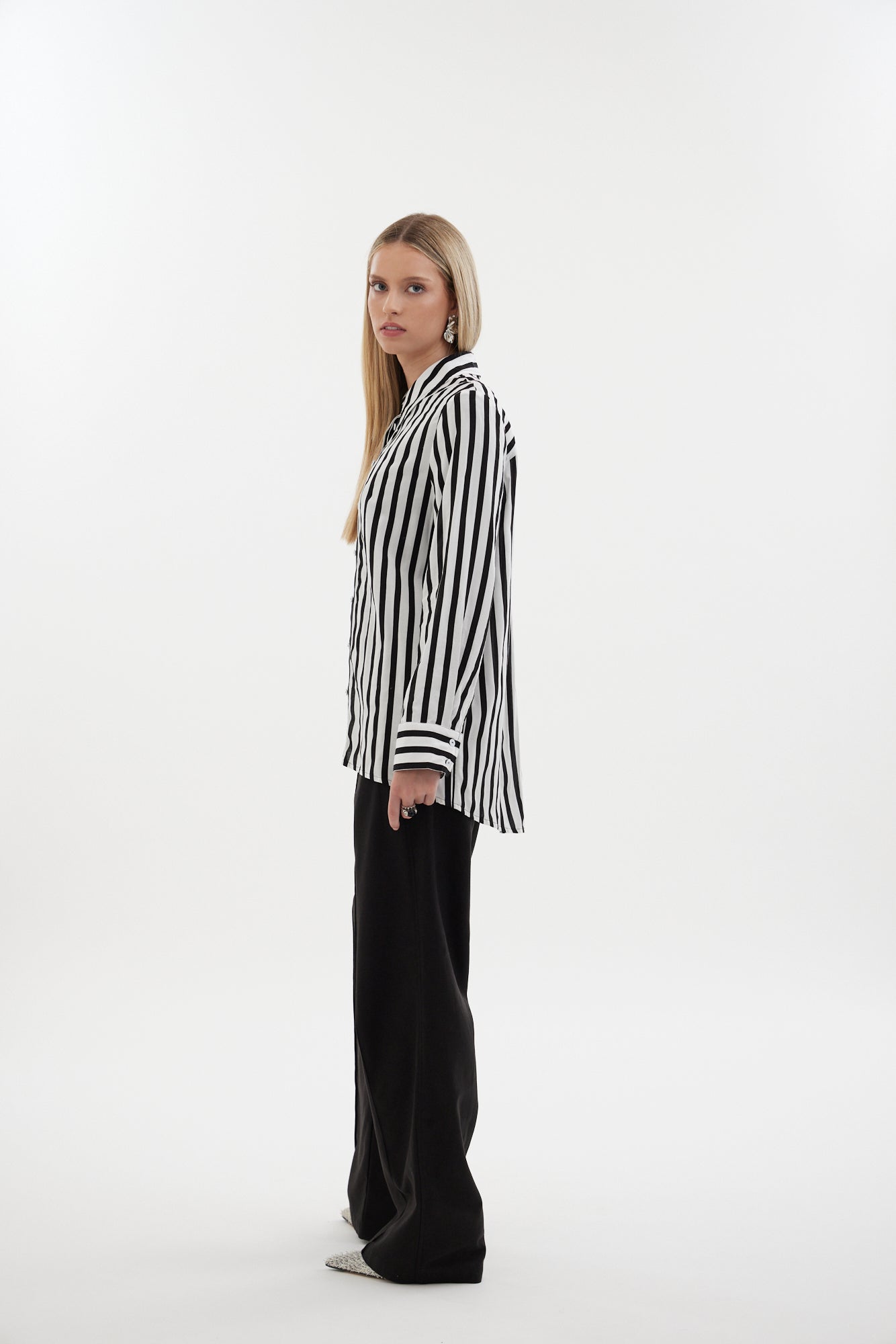 The Icon Shirt by Racket - a relaxed stripe shirt with concealed placket, back yoke pleats and stepped hem. Includes exclusive RKT logo stripe. Made in NZ.
