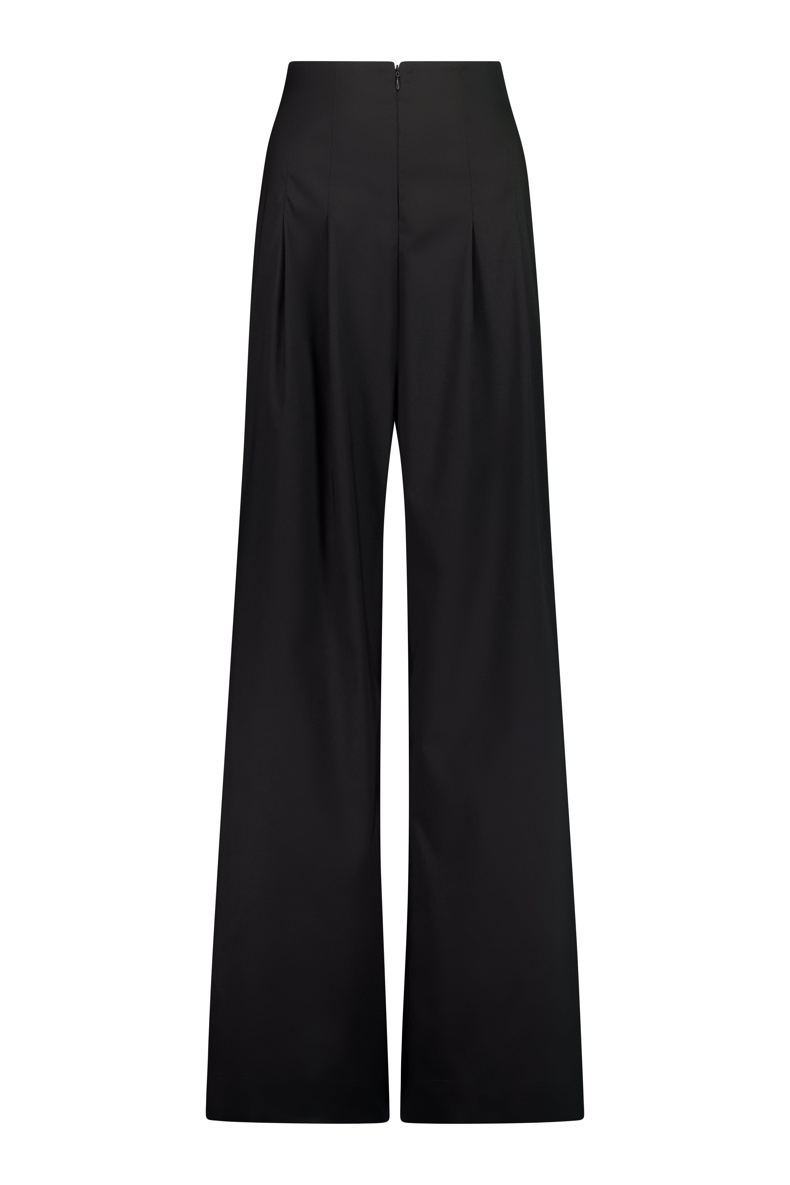 The Motion Pant by Racket — a wide leg cotton pant with double pleats and flexible comfort. Available in black or latte and two inseam lengths. NZ Made.