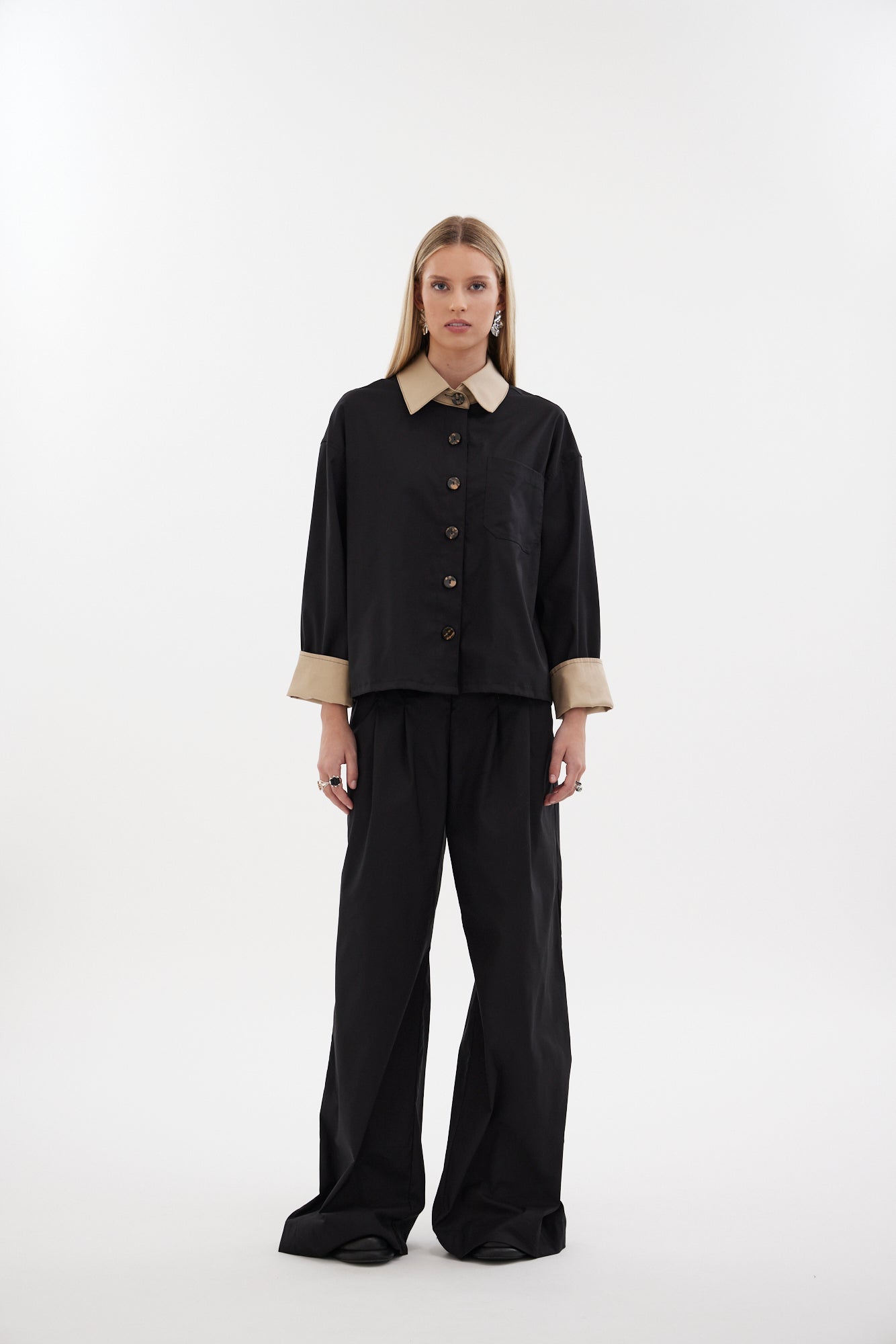 The Motion Shirt by Racket — a cropped, boxy shirt-shacket in cotton lycra with contrast details. Pair with the Motion Pant for a twin set. NZ made.