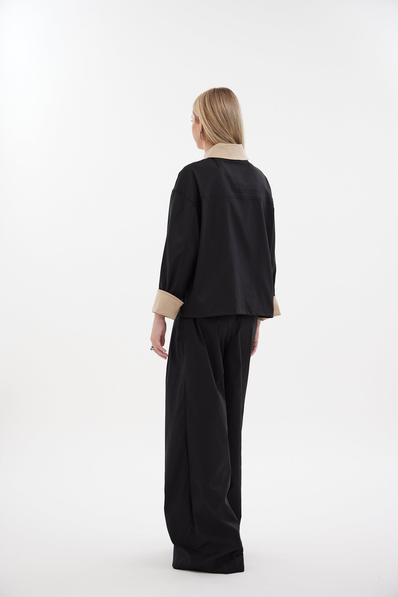 The Motion Shirt by Racket — a cropped, boxy shirt-shacket in cotton lycra with contrast details. Pair with the Motion Pant for a twin set. NZ made.