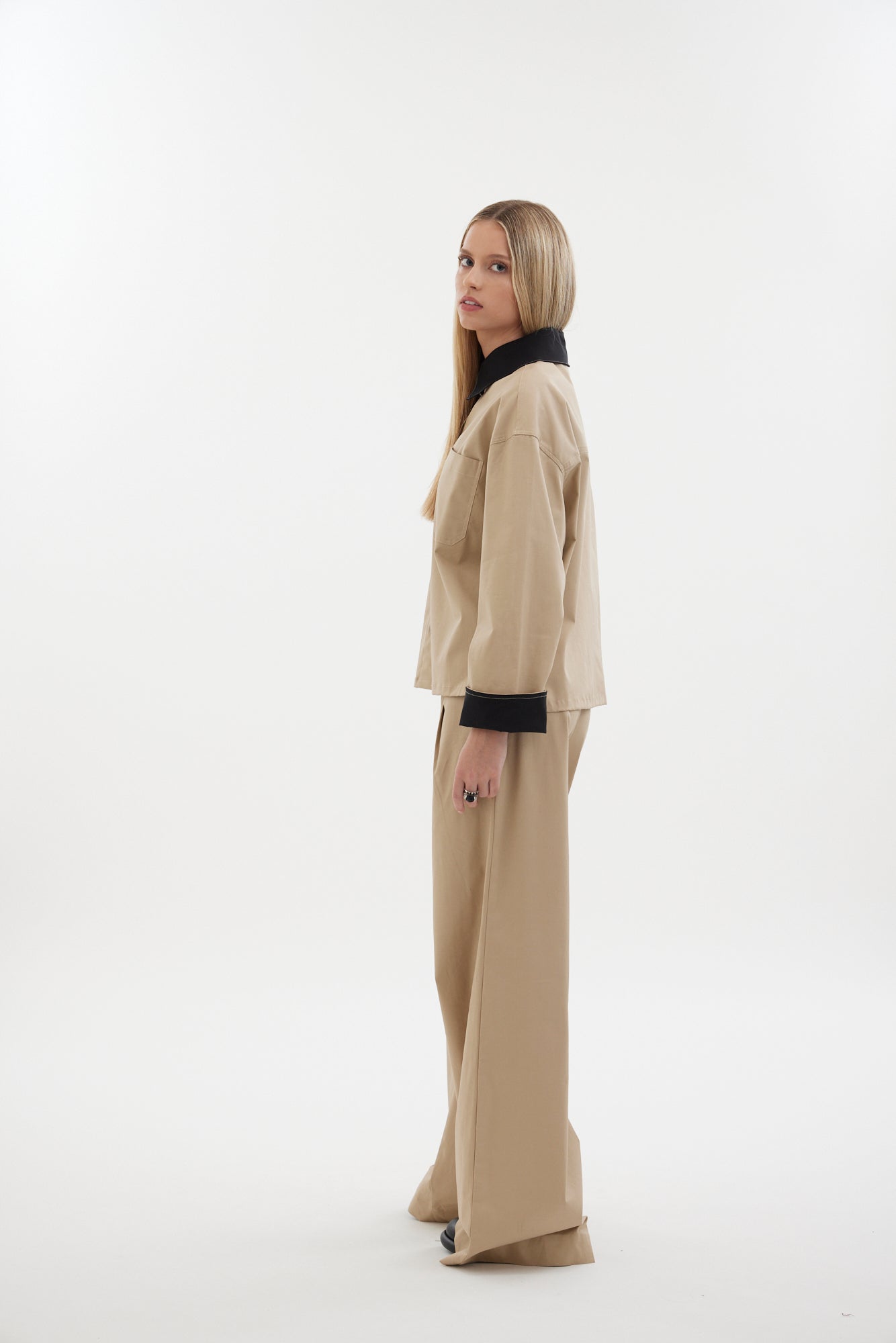 The Motion Shirt by Racket — a cropped, boxy shirt-shacket in cotton lycra with contrast details. Pair with the Motion Pant for a twin set. NZ made.