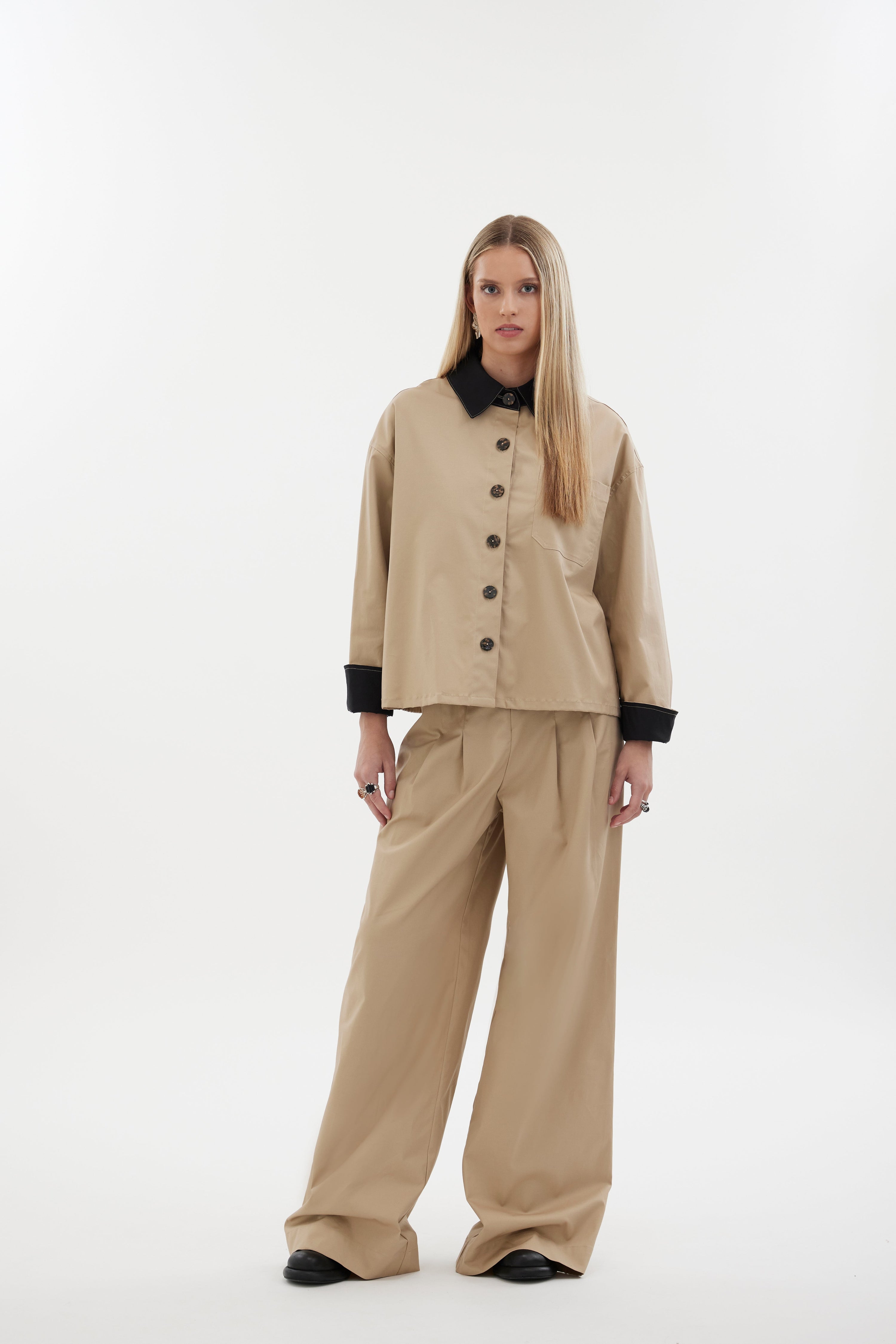 The Motion Shirt by Racket — a cropped, boxy shirt-shacket in cotton lycra with contrast details. Pair with the Motion Pant for a twin set. NZ made.