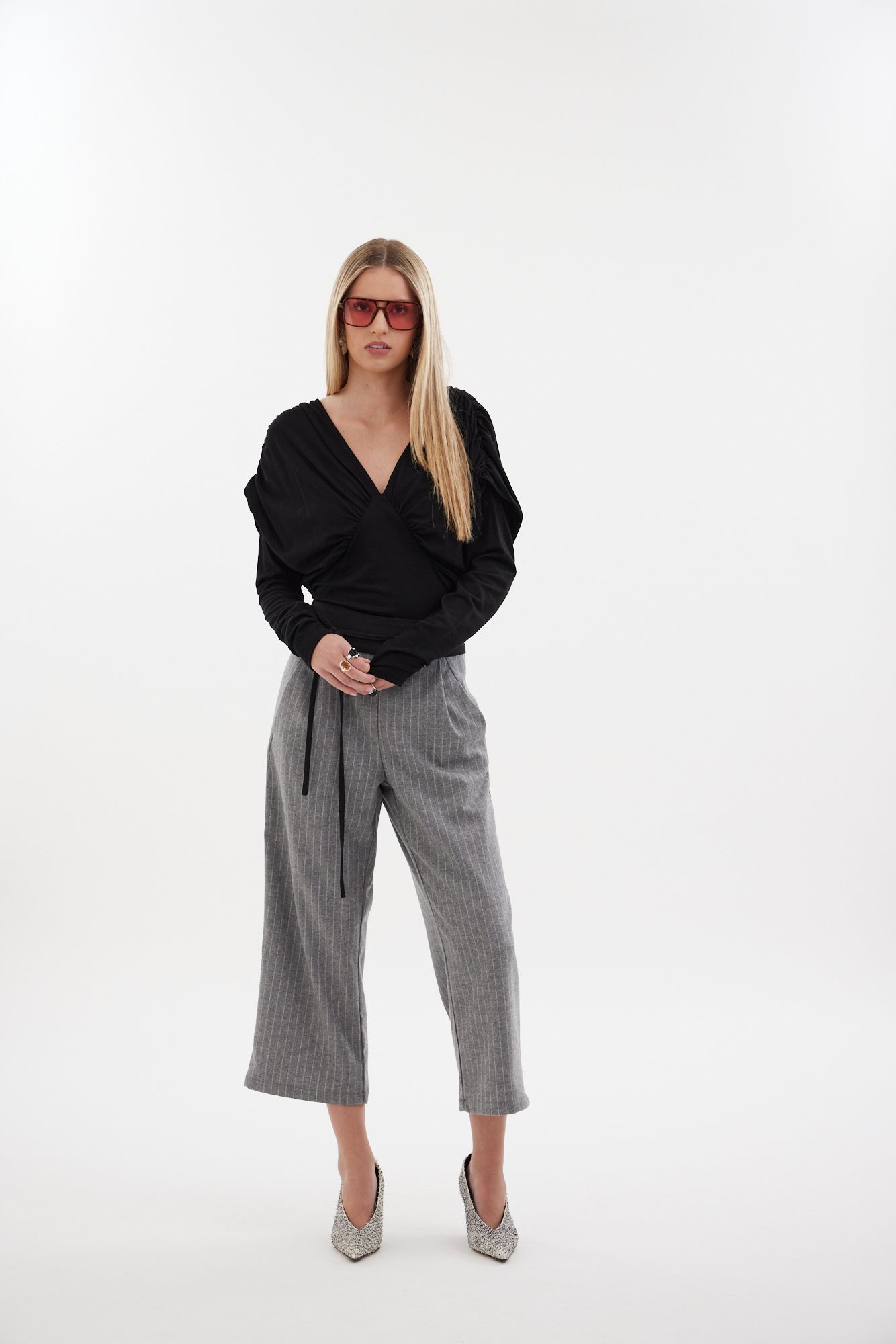 The Muse Top by Racket - a 100% merino long sleeve top with V-neck, rouched detailing and sleek sleeves. Refined comfort, made in NZ.