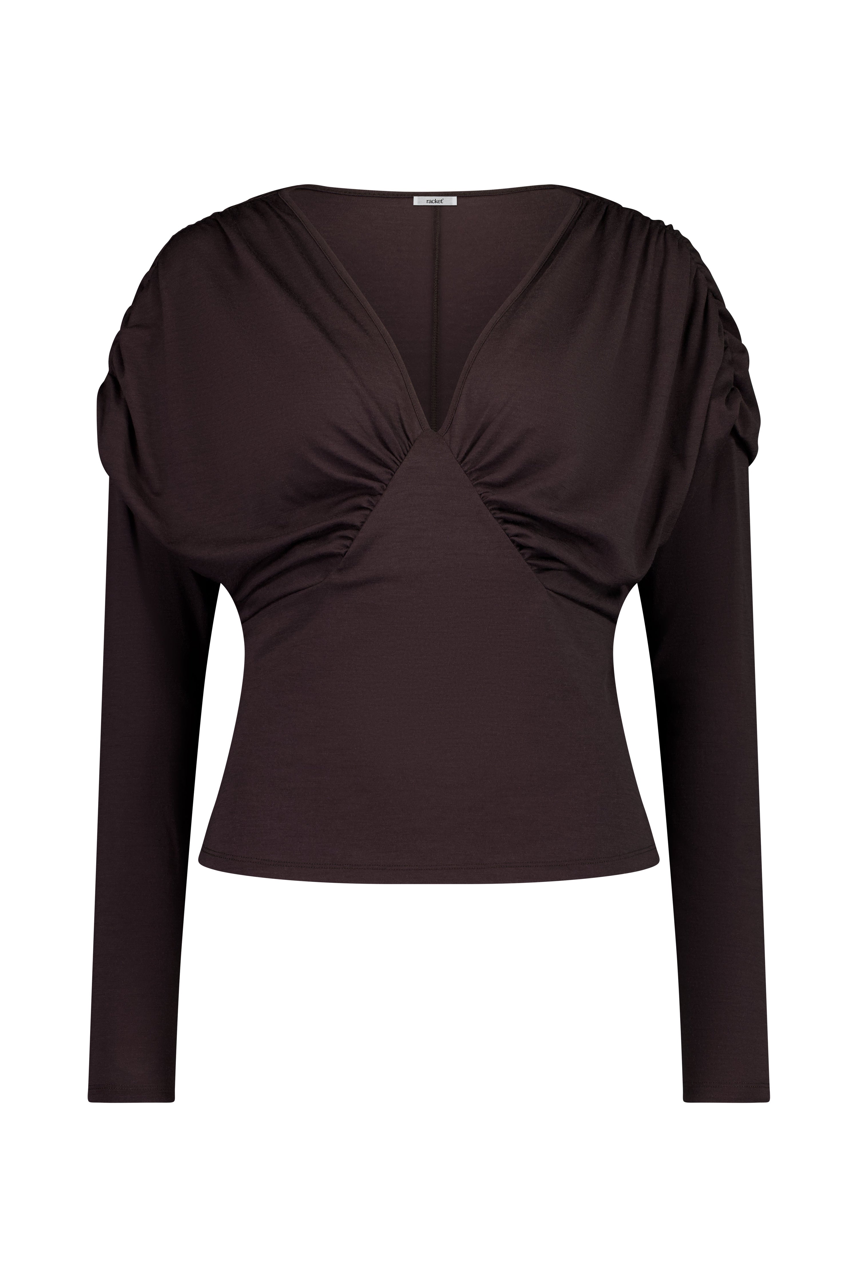 The Muse Top by Racket - a 100% merino long sleeve top with V-neck, rouched detailing and sleek sleeves. Refined comfort, made in NZ.