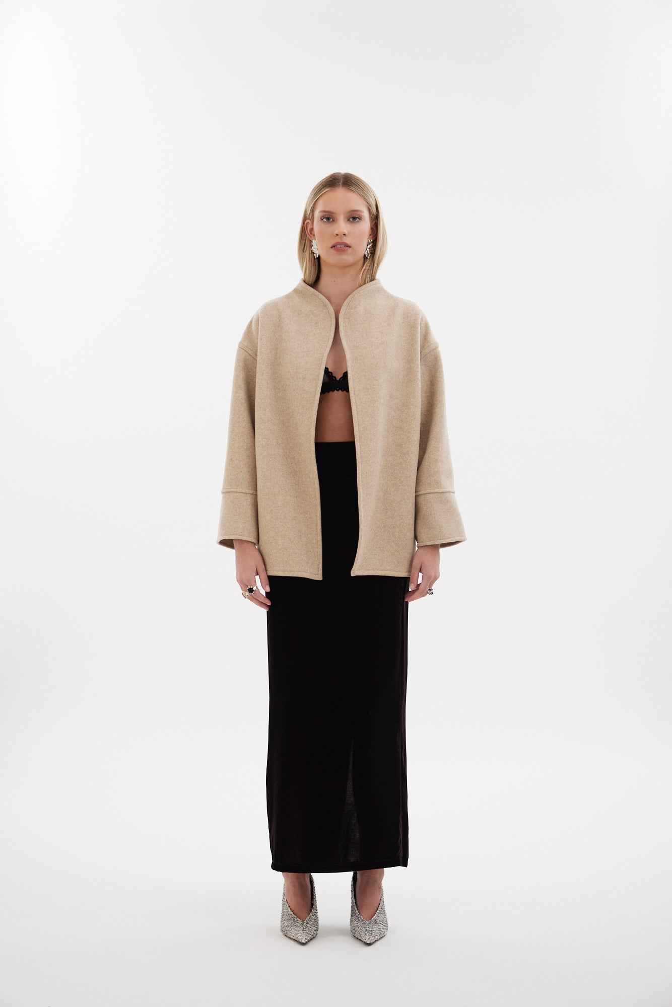 The Pitch Coat by Racket - an upper-thigh wool coat with wide sleeves, flat felled seams and modern mandarin collar. Designed and made in NZ.