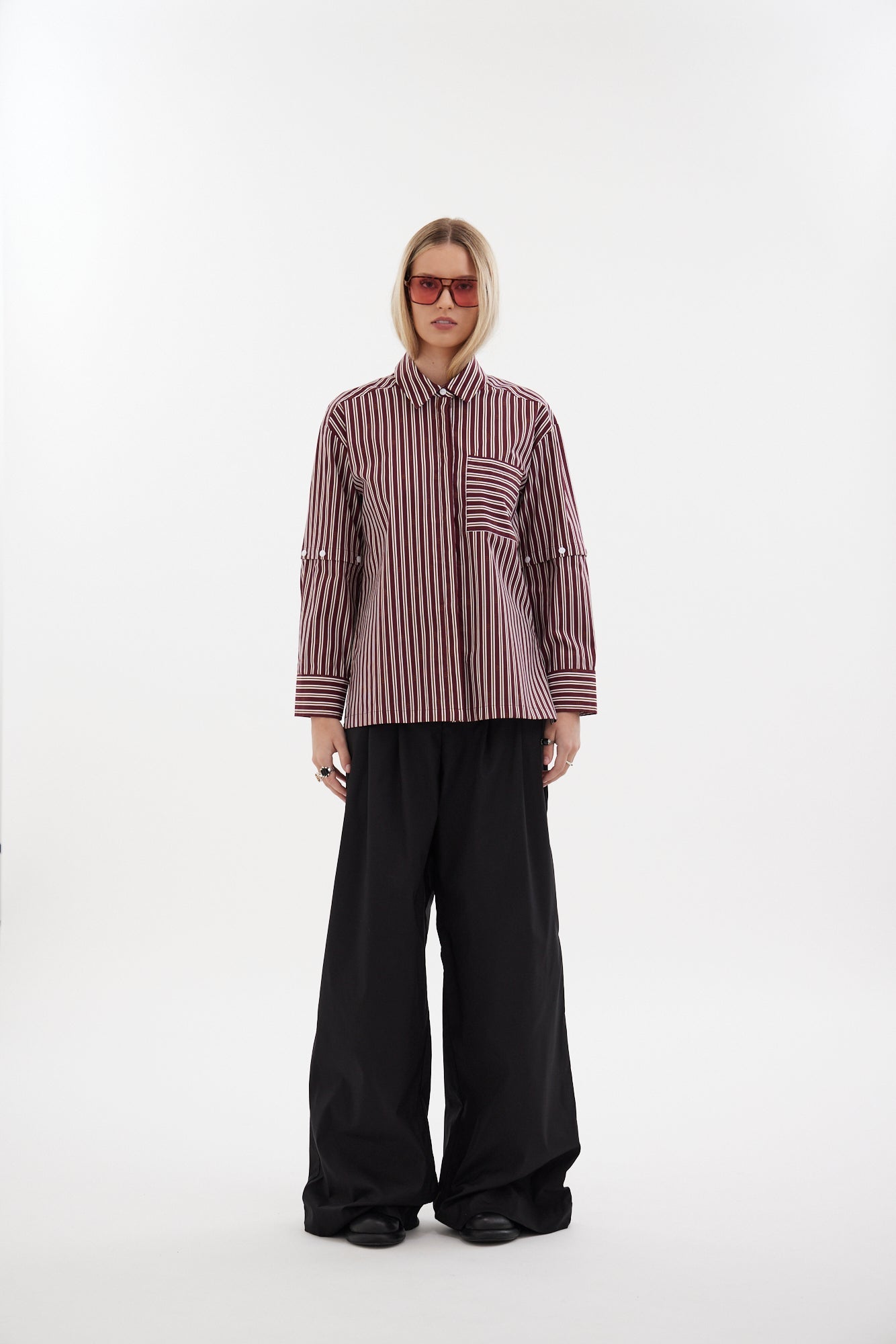 The Rebel Shirt by Racket - a two-in-one shirt with button off sleeves, boxy fit and refined detailing. Available in RKT stripe, white or black. NZ made.